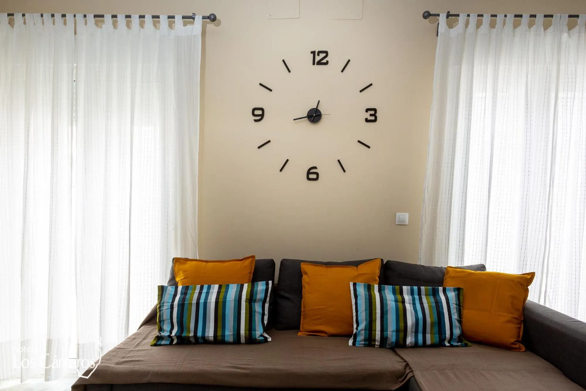 Living room, Bed in Apartamentos Los Cantaros