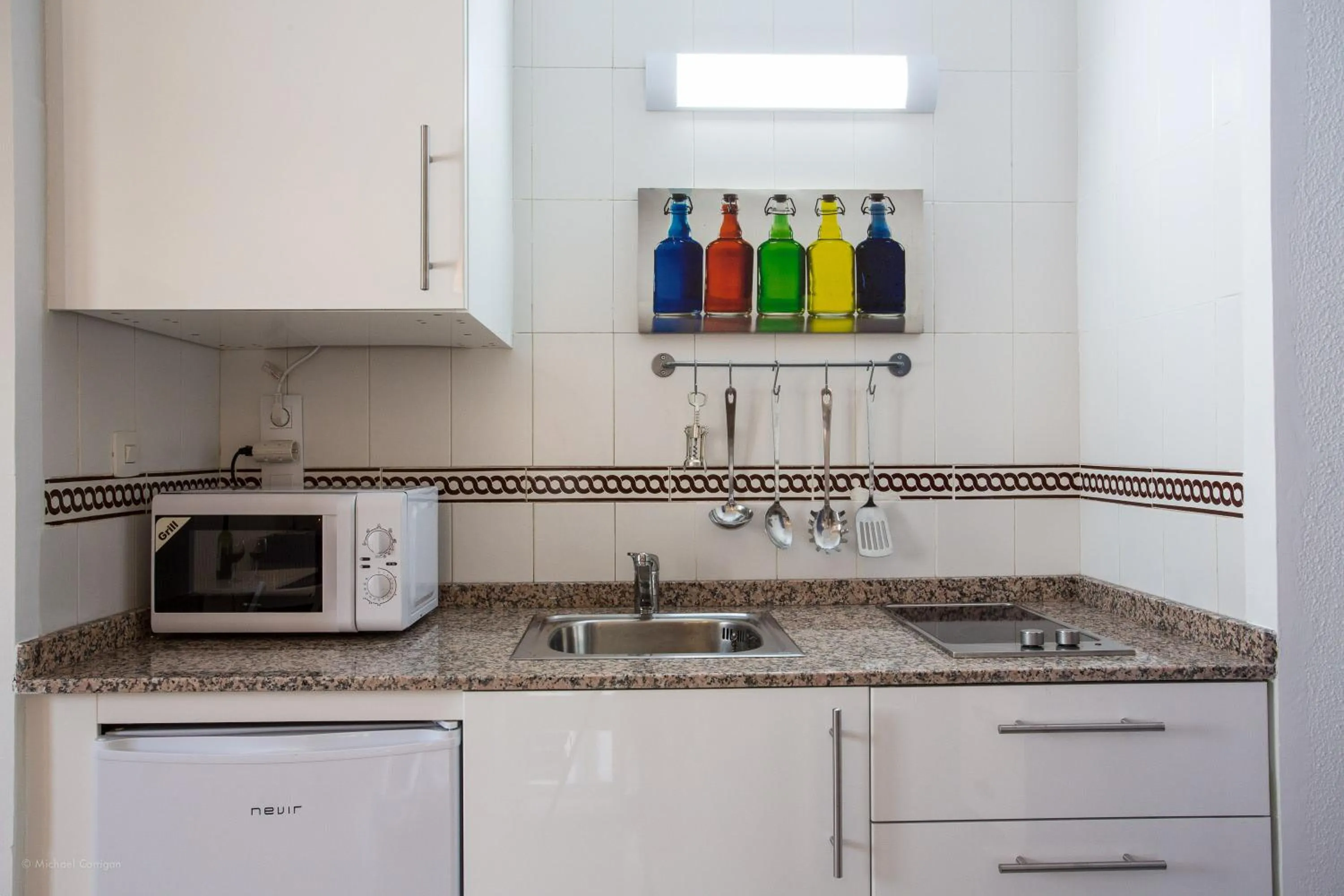Kitchen or kitchenette in Apartamentos Los Cantaros