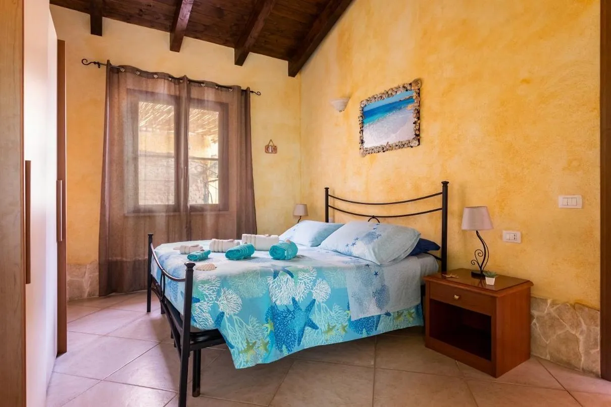 Bed in Affittacamere Shardana