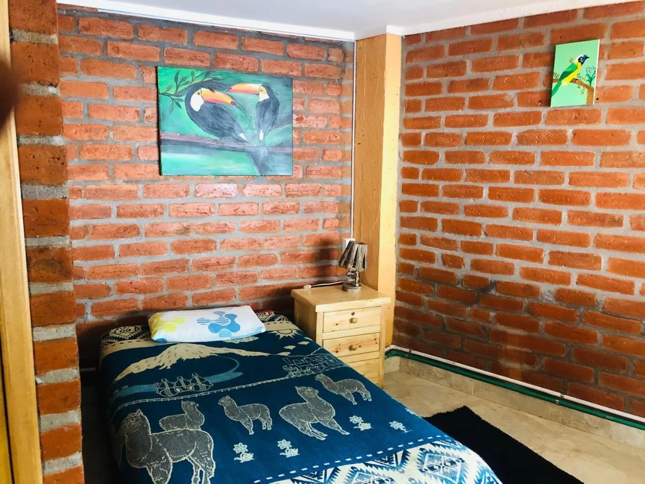 Bed in Hostal La Casa Amarilla City