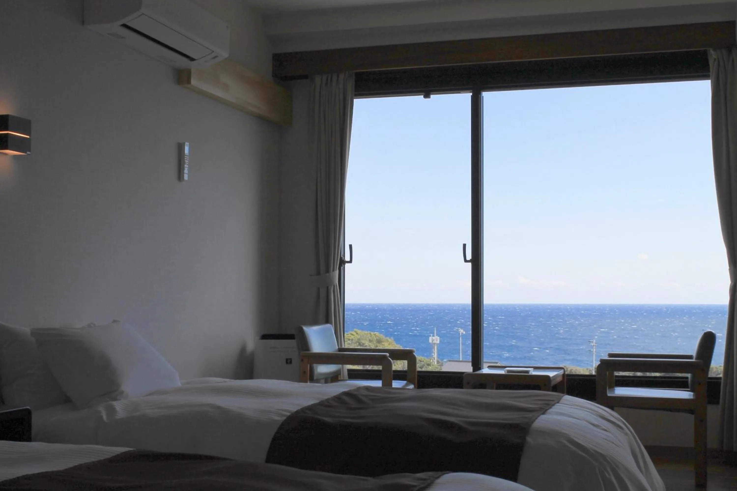 Photo of the whole room, Bed in Ashizuri Kokusai Hotel