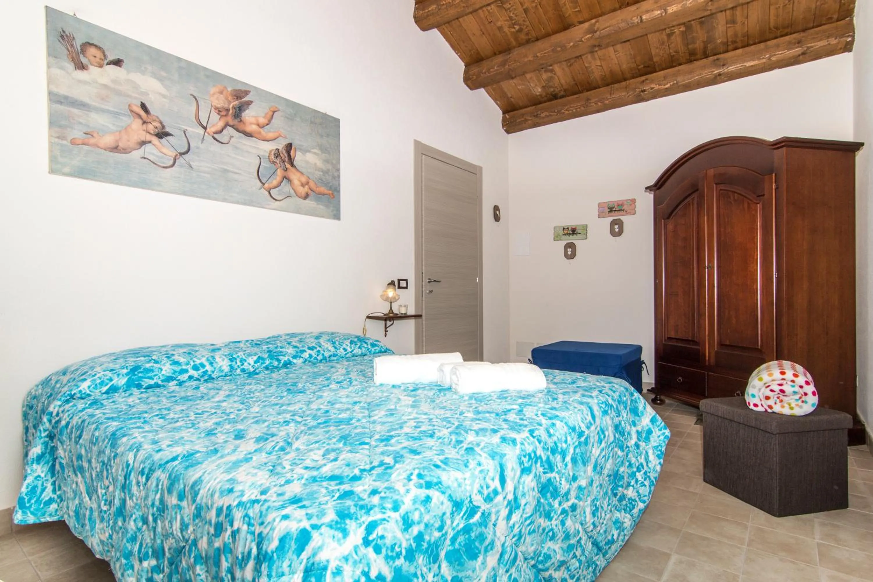 Photo of the whole room, Bed in Abbraccio del Carrubo