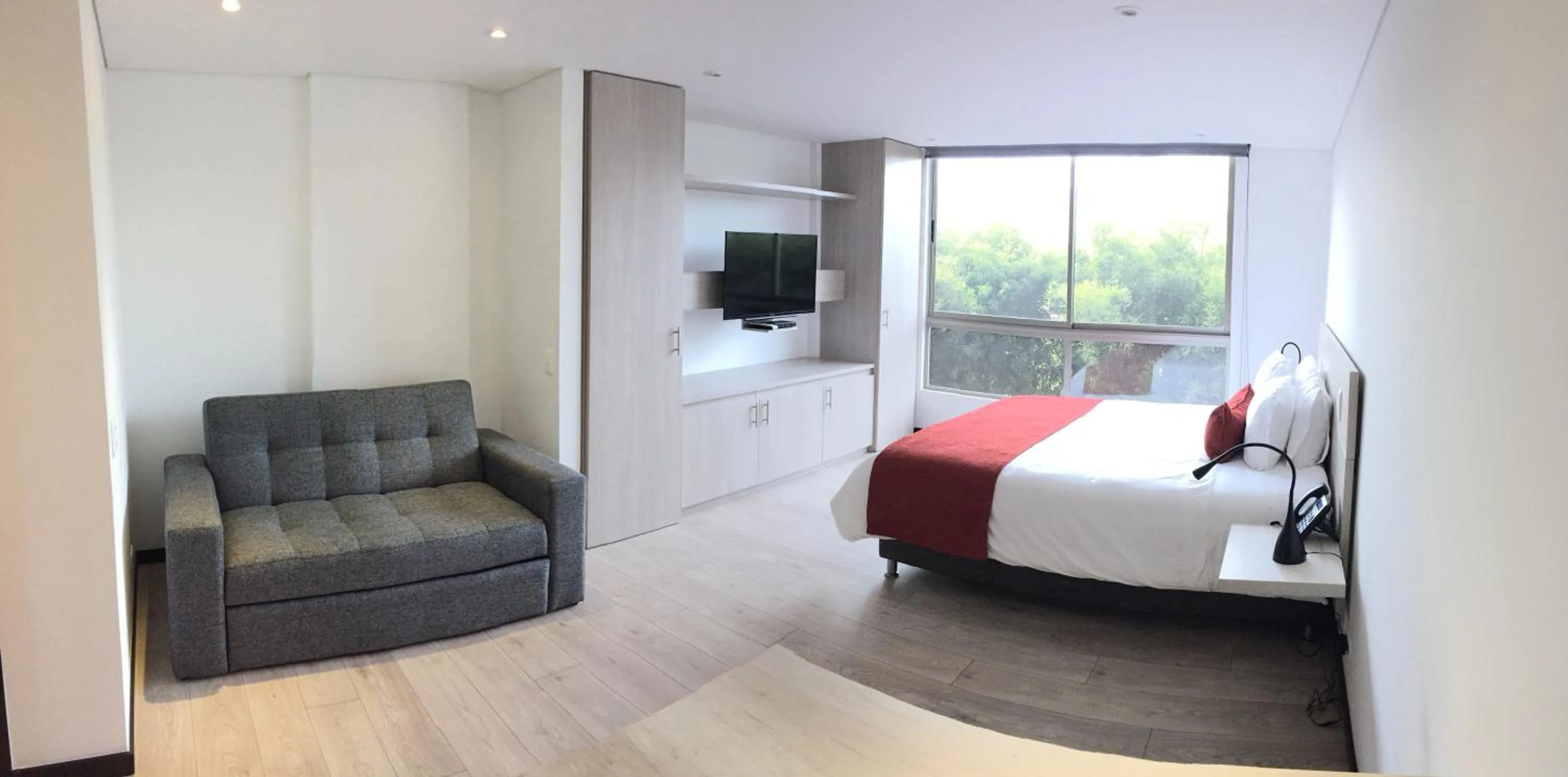 Photo of the whole room in MG Hotels & Suites