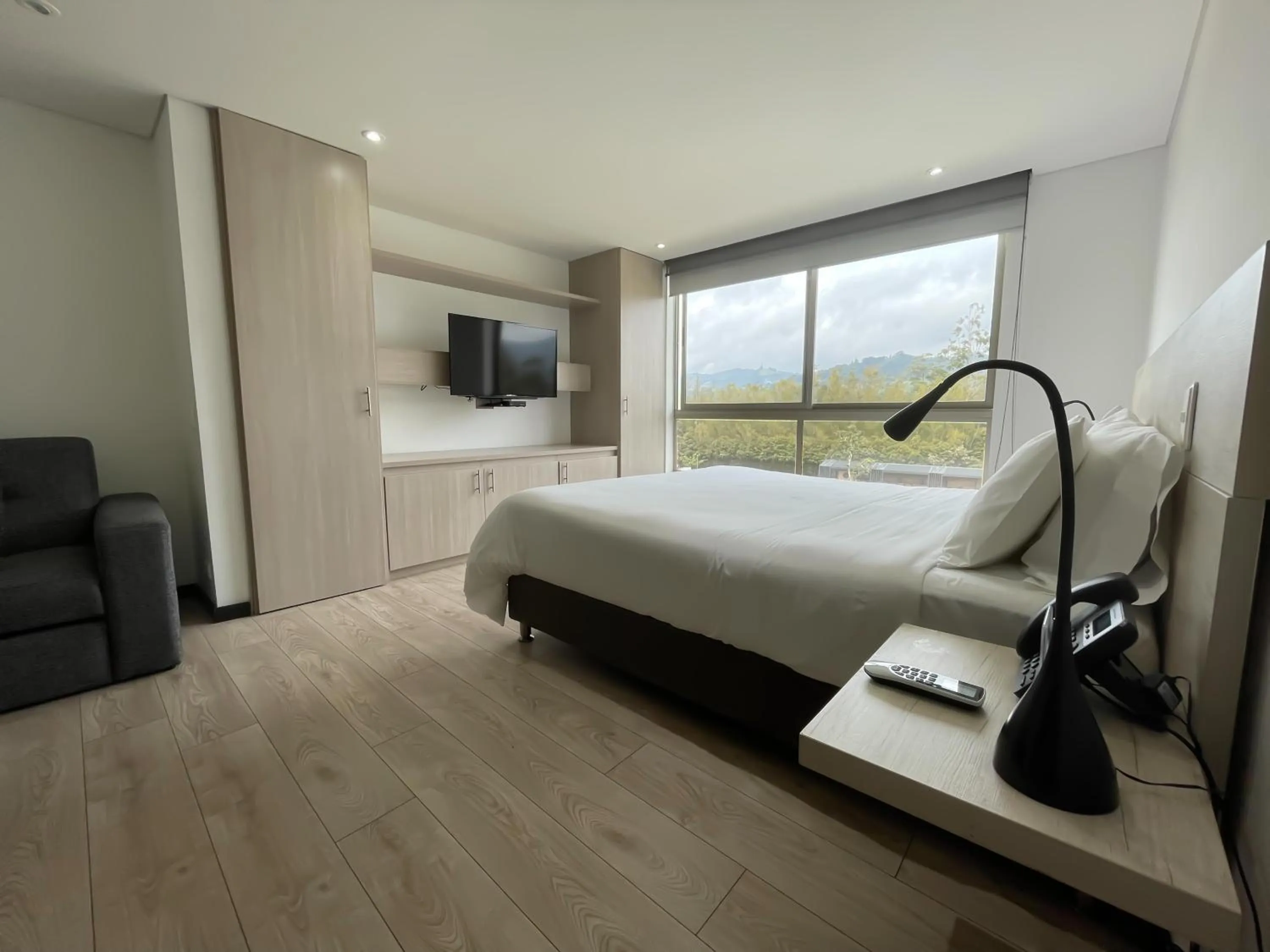 Bed in MG Hotels & Suites