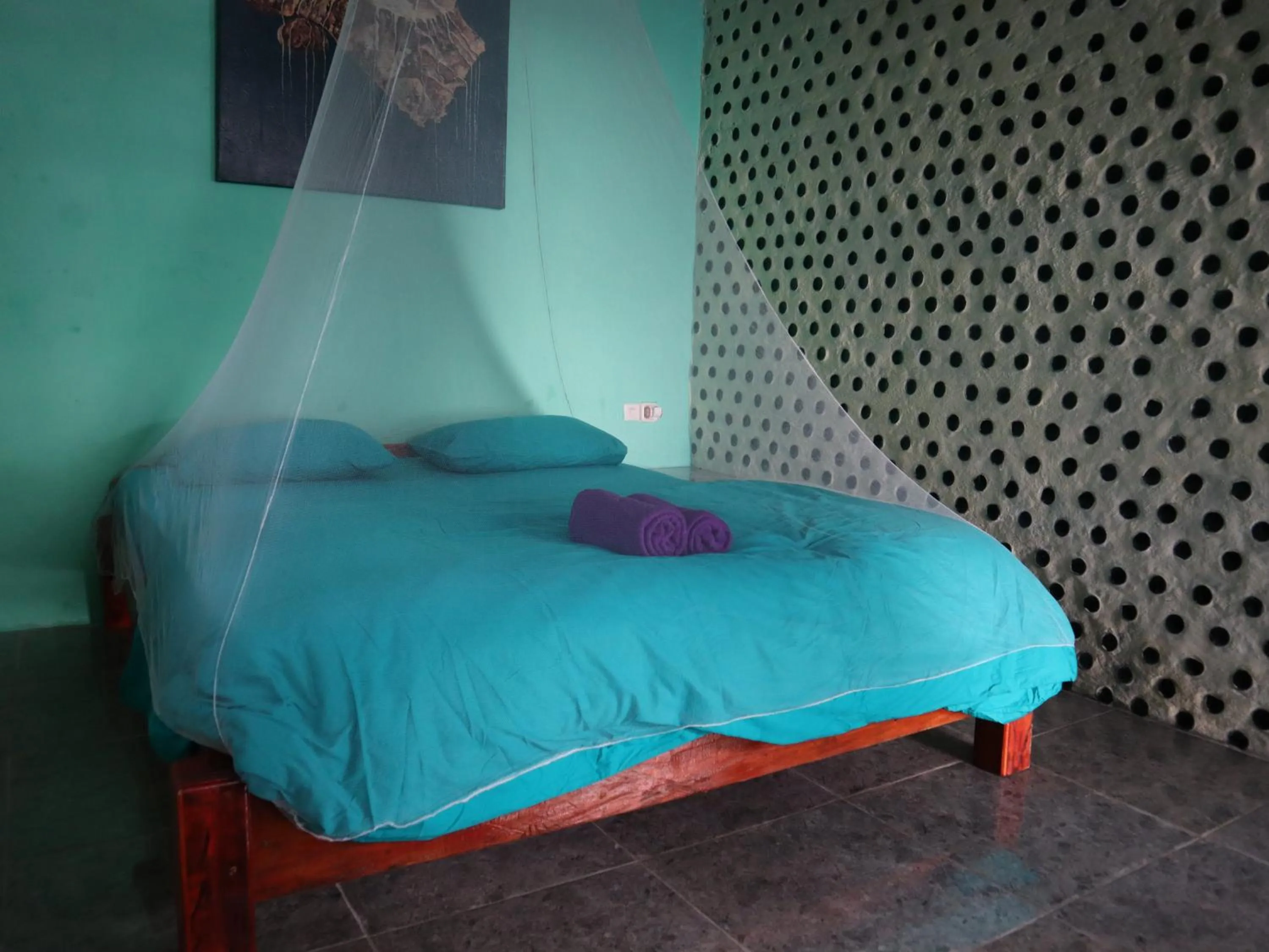 Bed in Ricky's Beach House