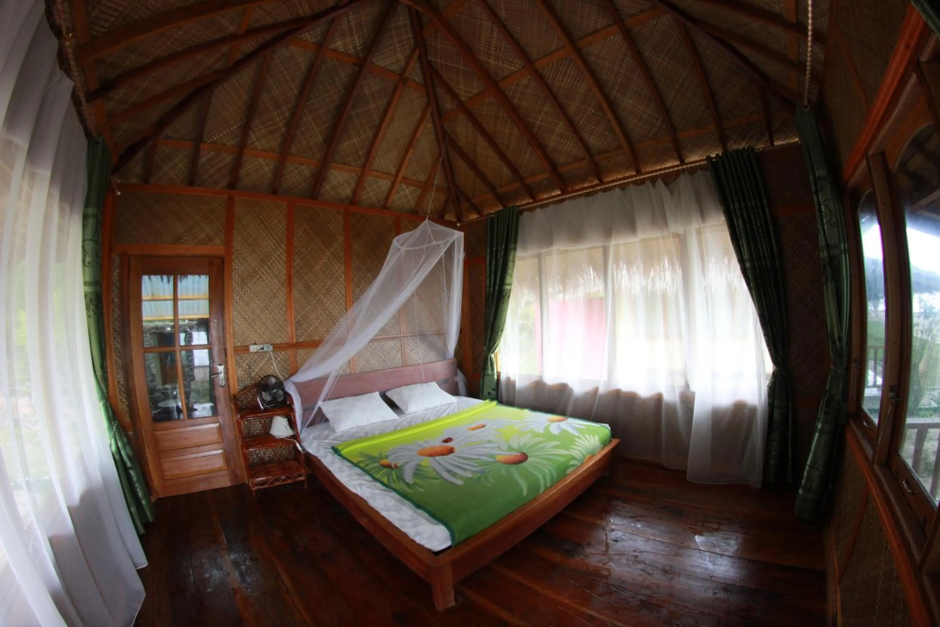 Photo of the whole room, Bed in Ricky's Beach House