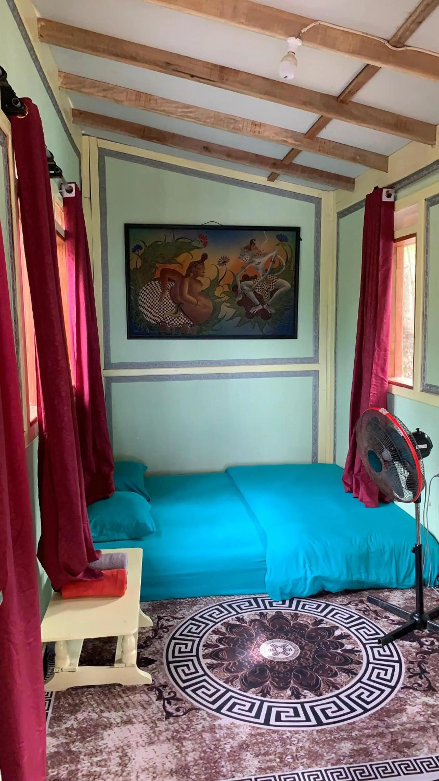 Bed in Ricky's Beach House