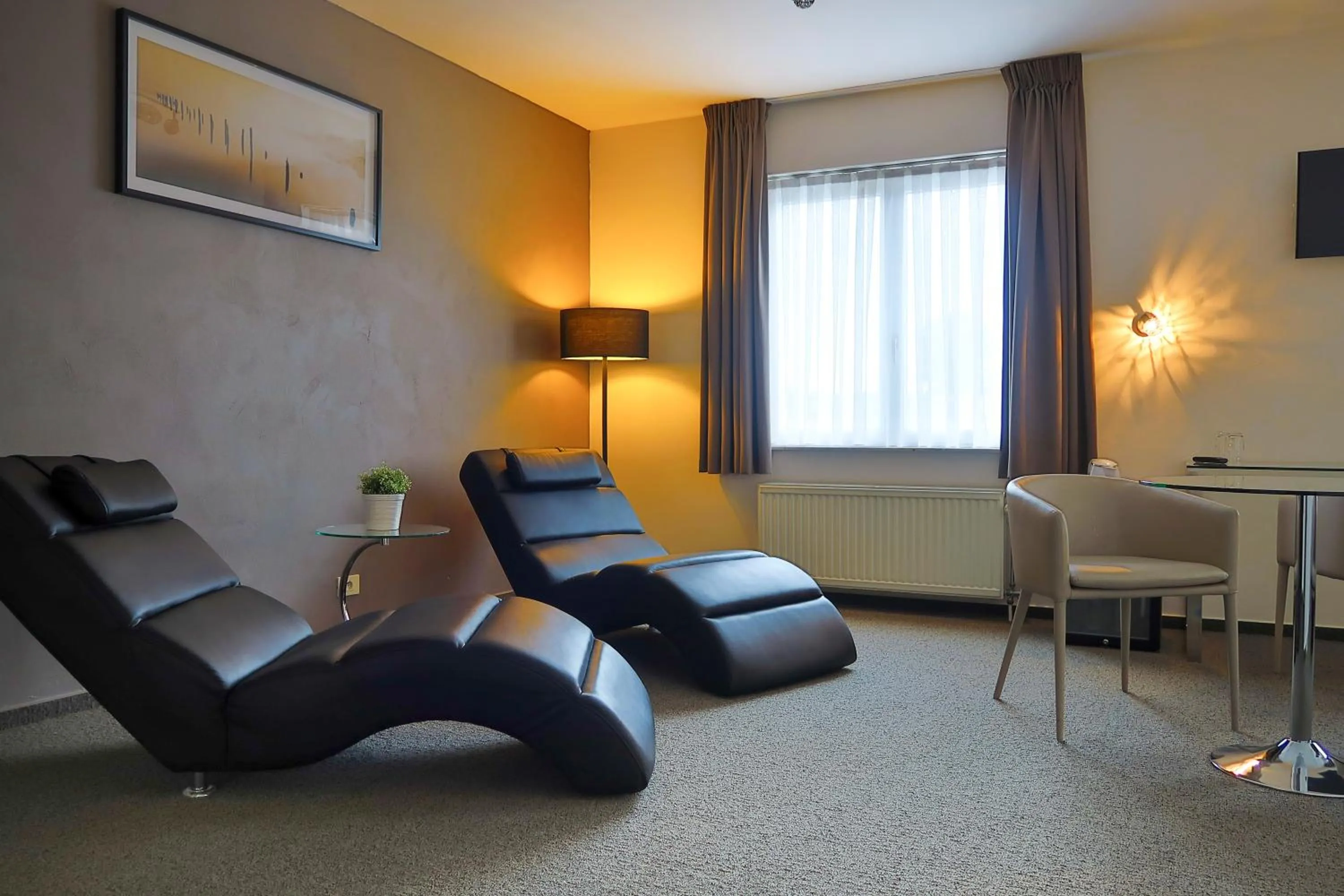 TV and multimedia in Hotel Adoma