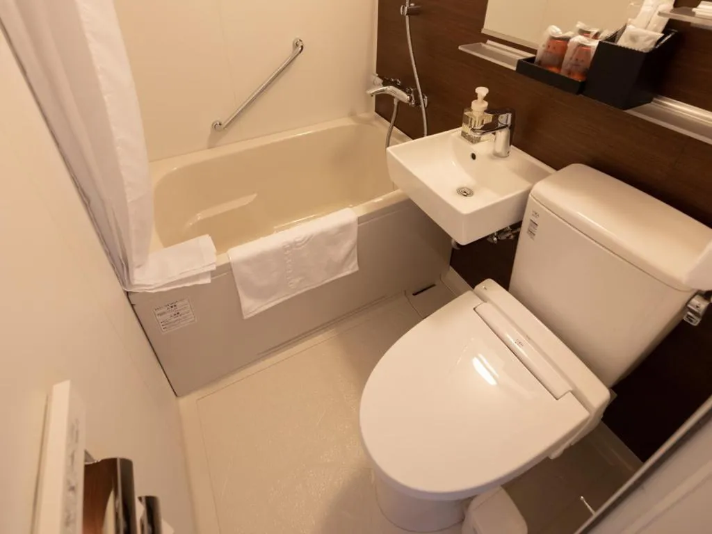 Bathroom in Central Hotel Takeoonsen Ekimae