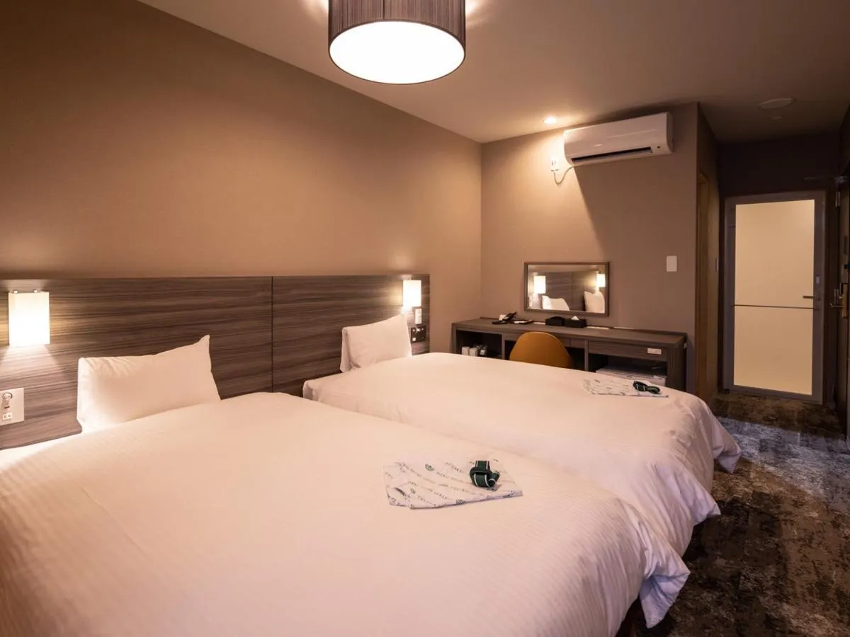 Photo of the whole room, Bed in Central Hotel Takeoonsen Ekimae