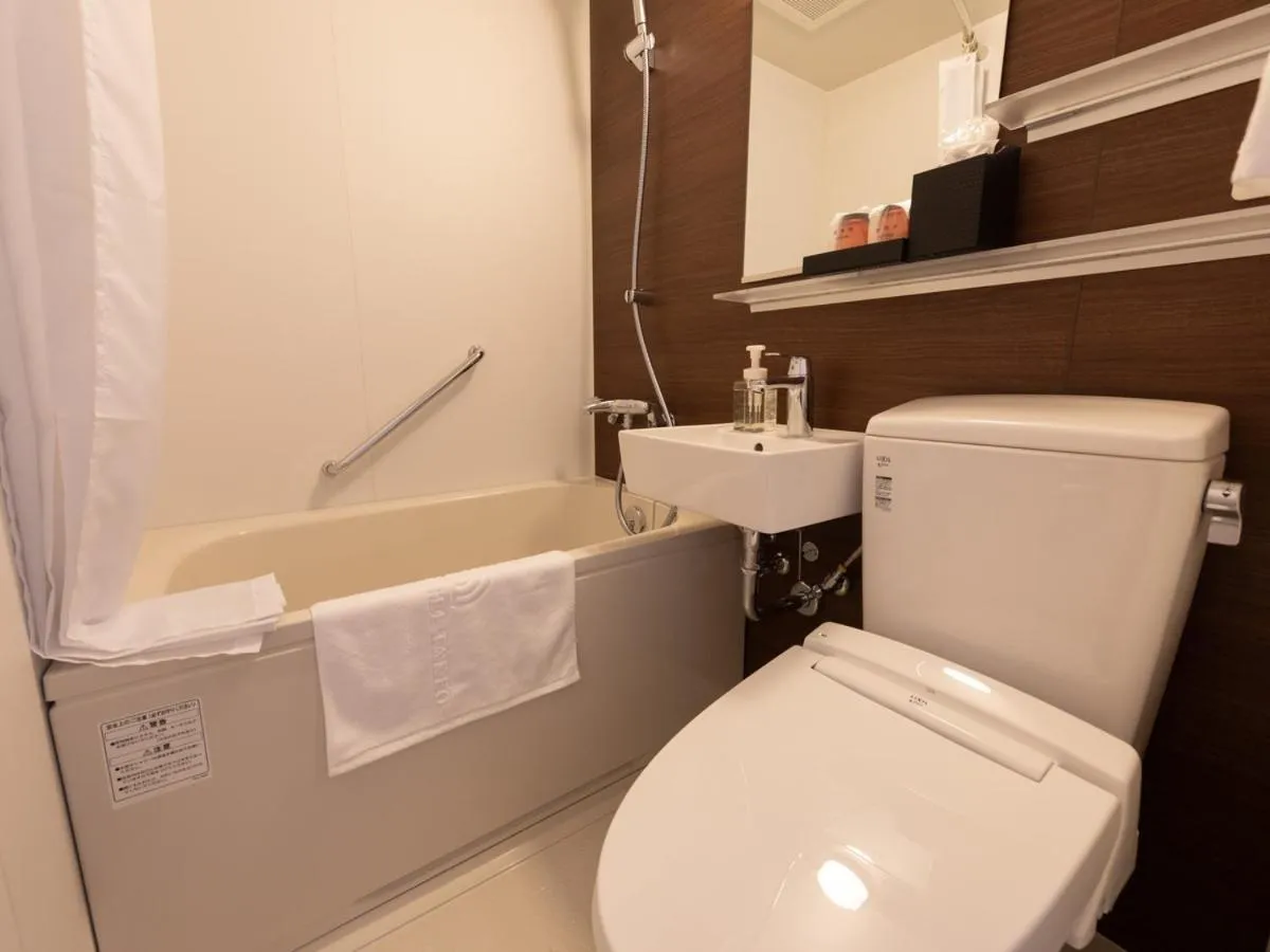 Bathroom in Central Hotel Takeoonsen Ekimae