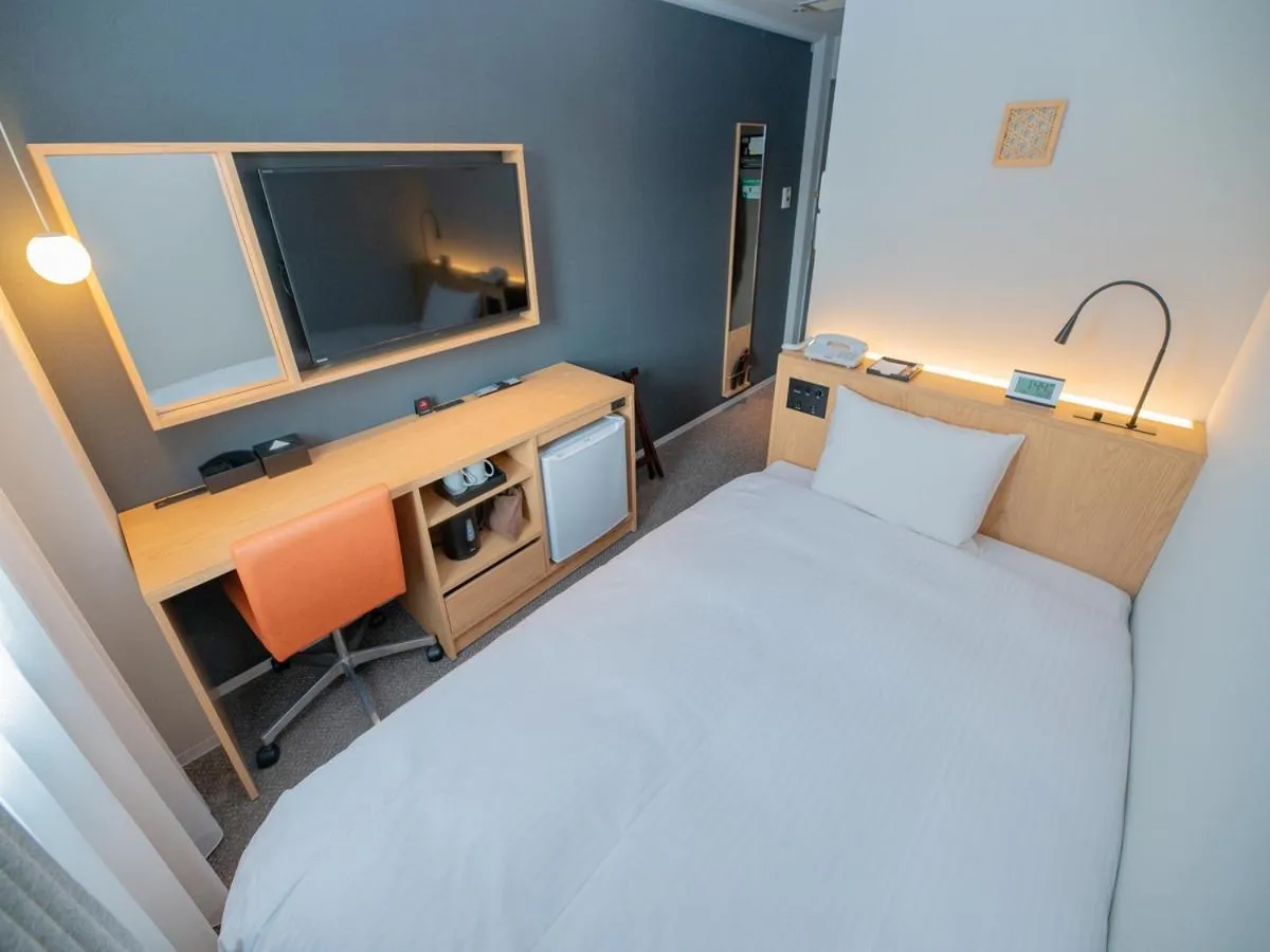 Bed in Central Hotel Takeoonsen Ekimae