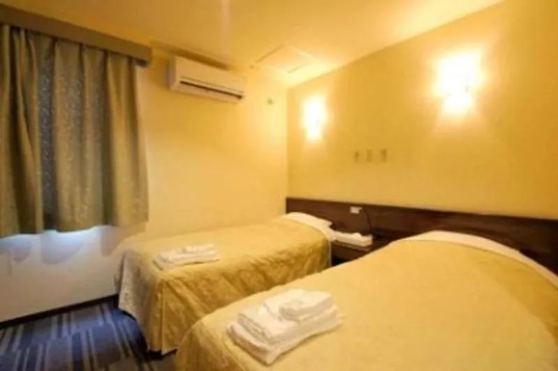 Bed in Comfesta Inn Kabe