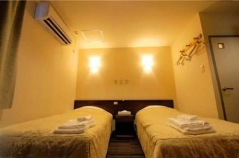 Bed in Comfesta Inn Kabe