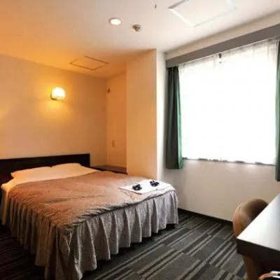 Bed in Comfesta Inn Kabe