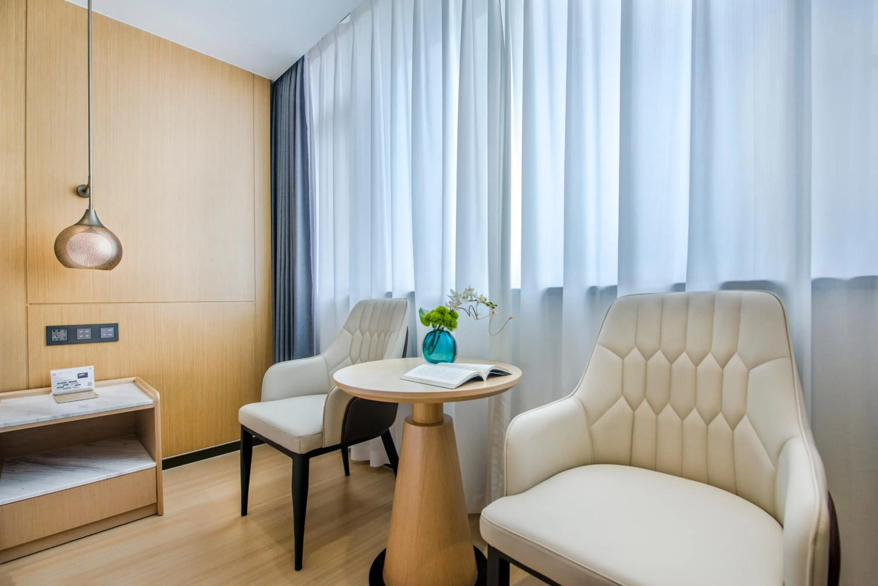 Seating area in Yiwu Baide Theme Hotel