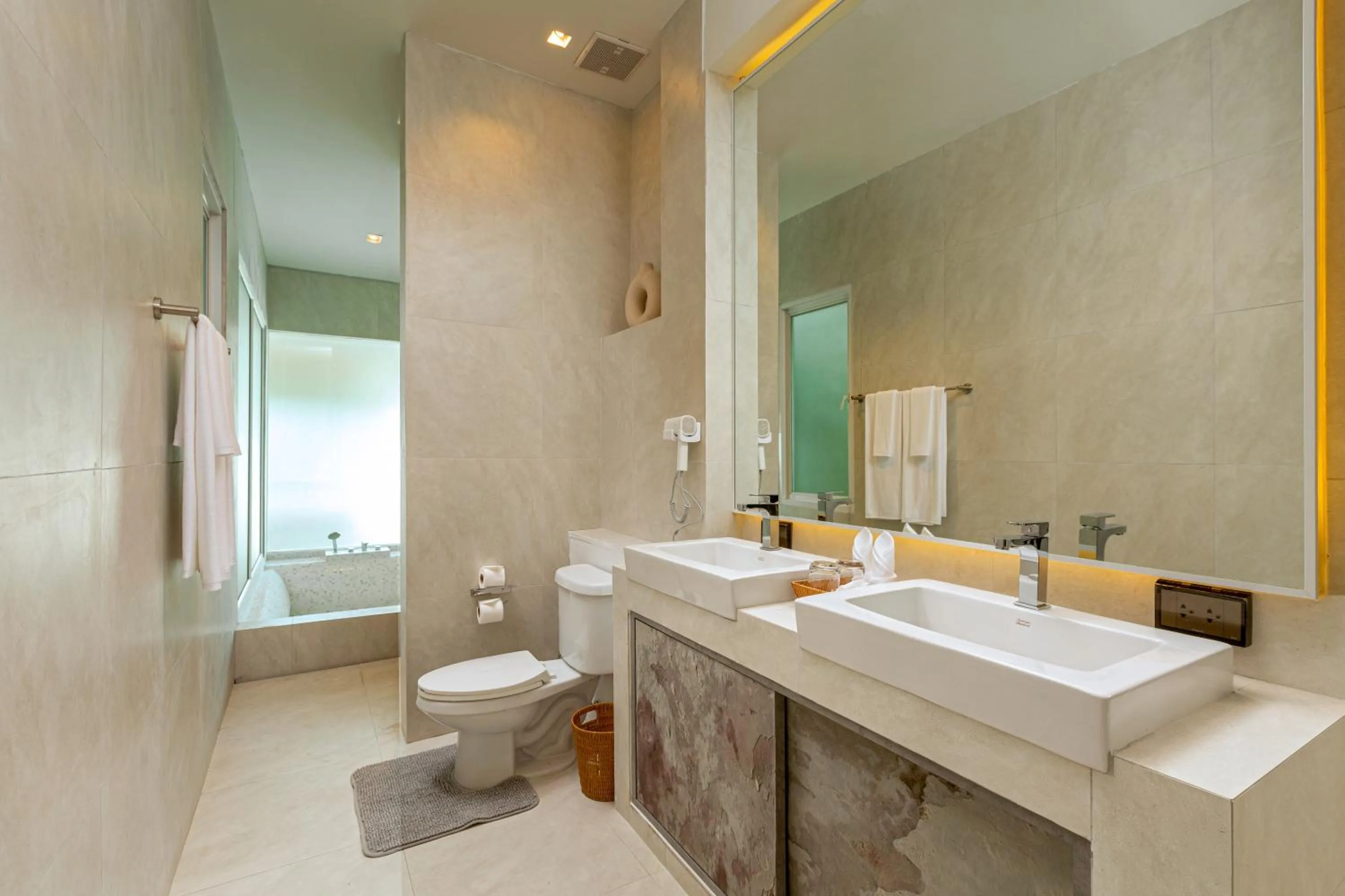 Toilet in Amala Grand Bleu Resort Hilltops - SHA