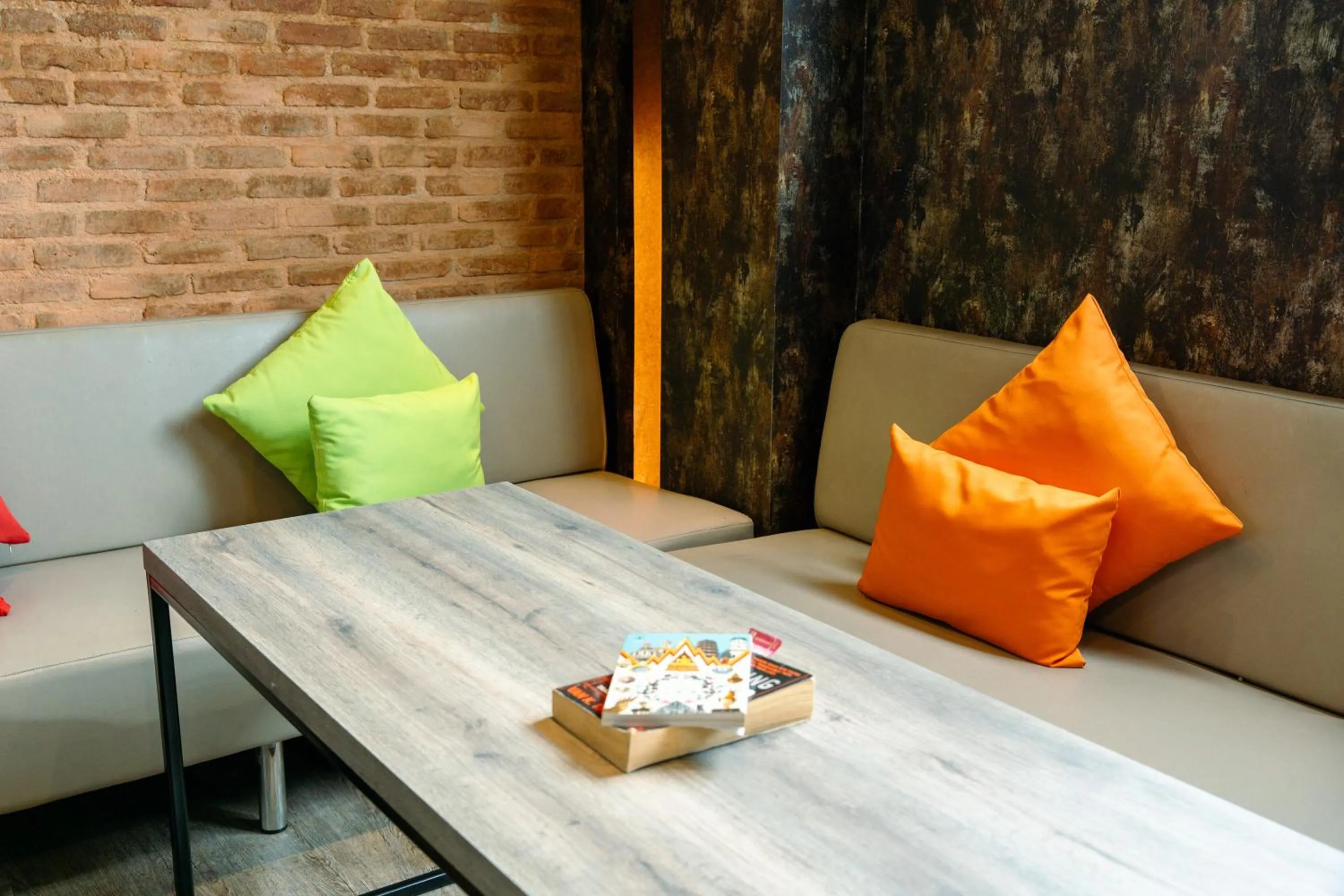 Communal lounge/ TV room in The Printing House Poshtel