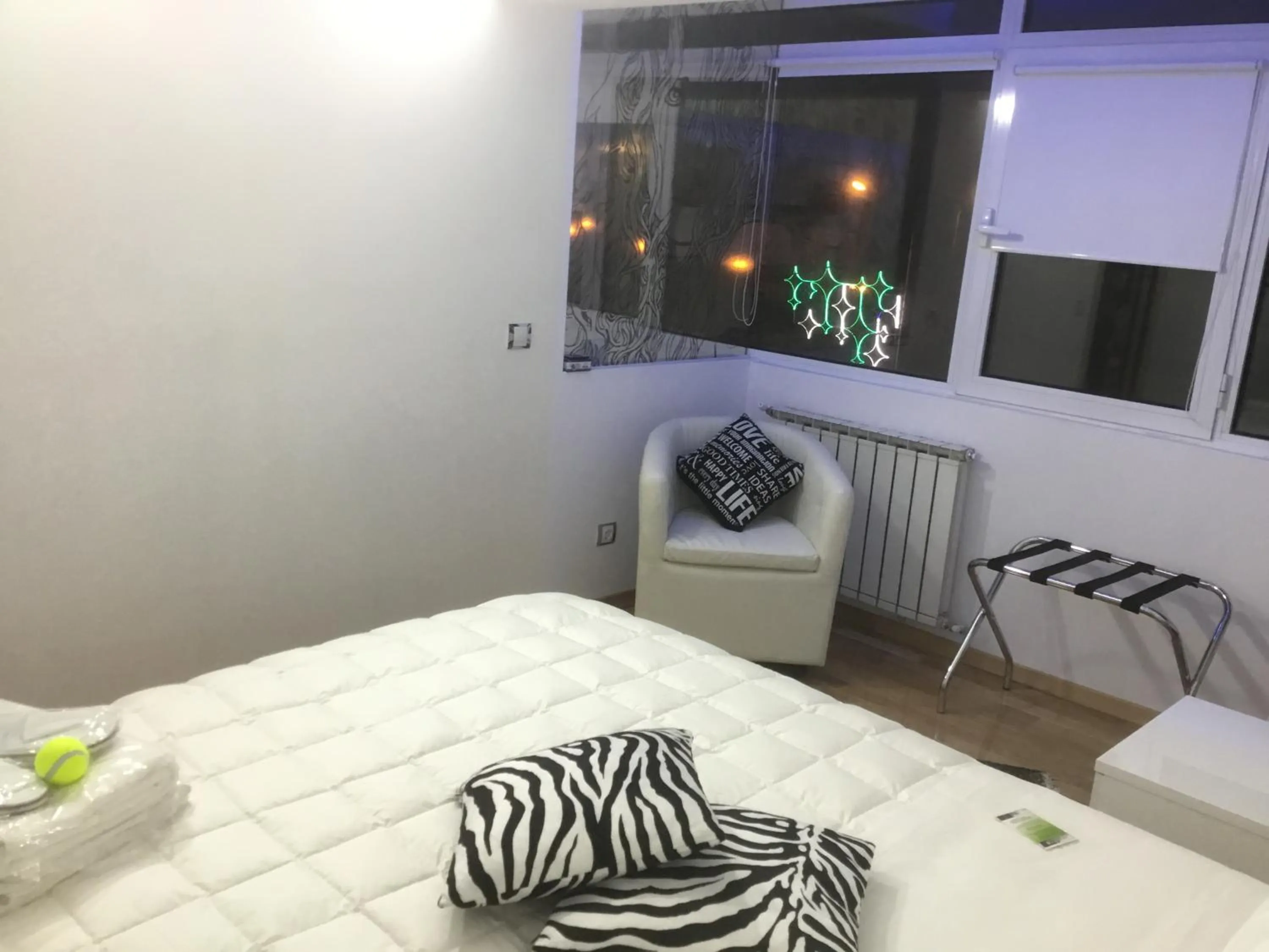 Bed in White Dream Suites