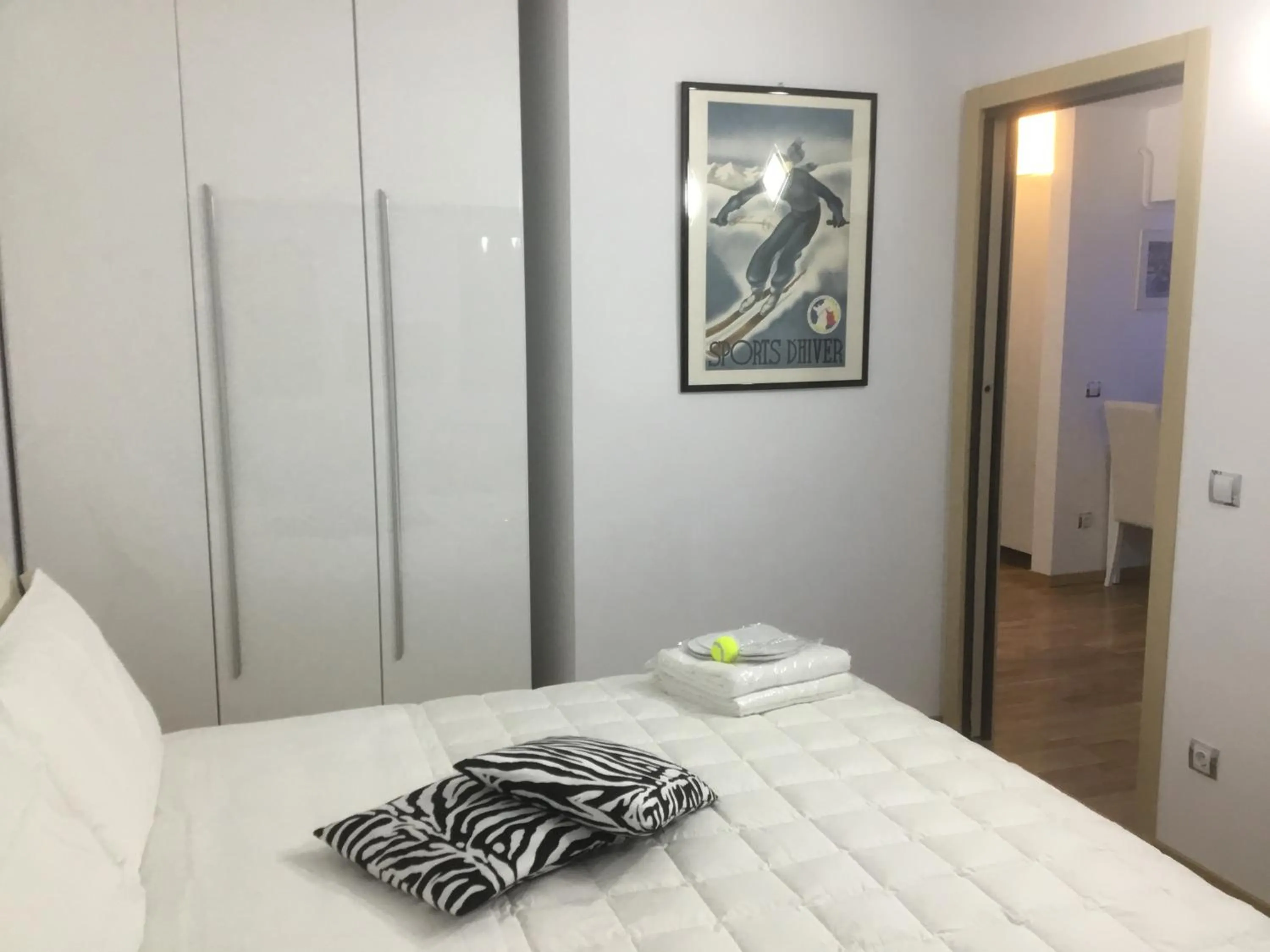 Bed in White Dream Suites