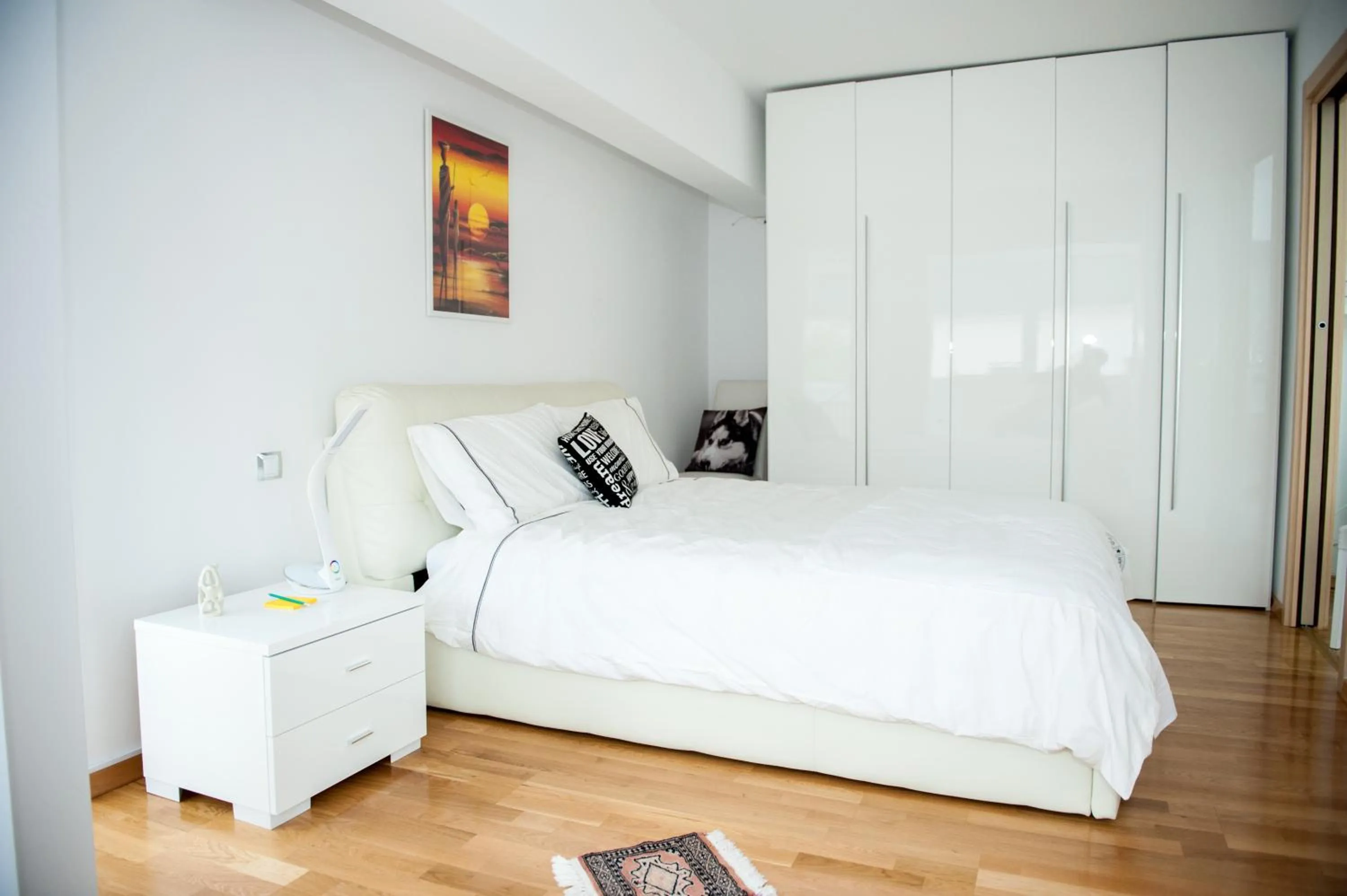 Bed in White Dream Suites