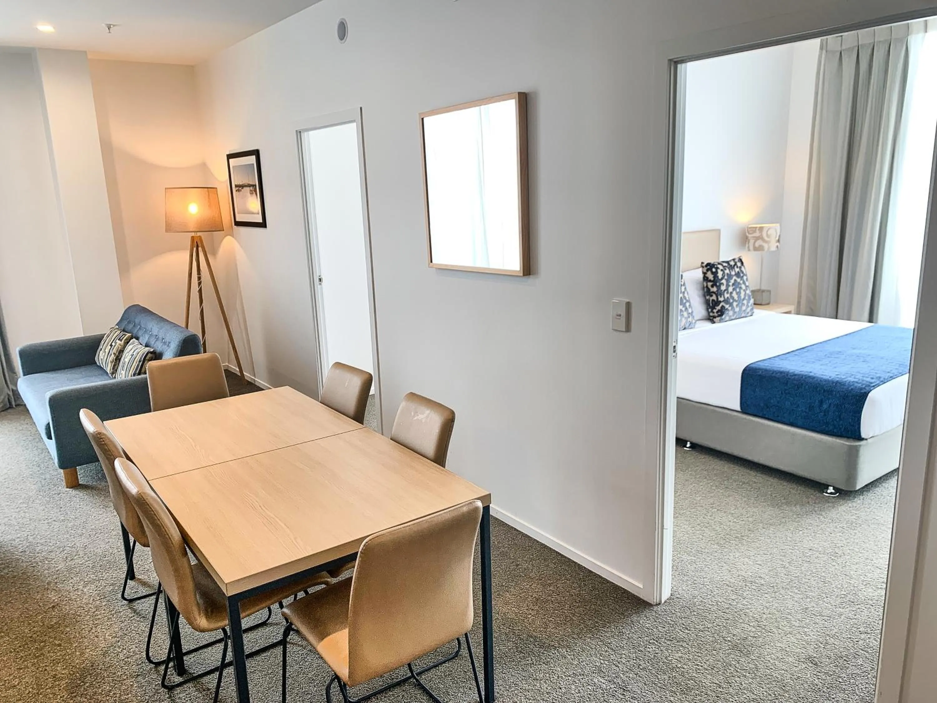 Dining area, Bed in Ramada Suites by Wyndham Albany