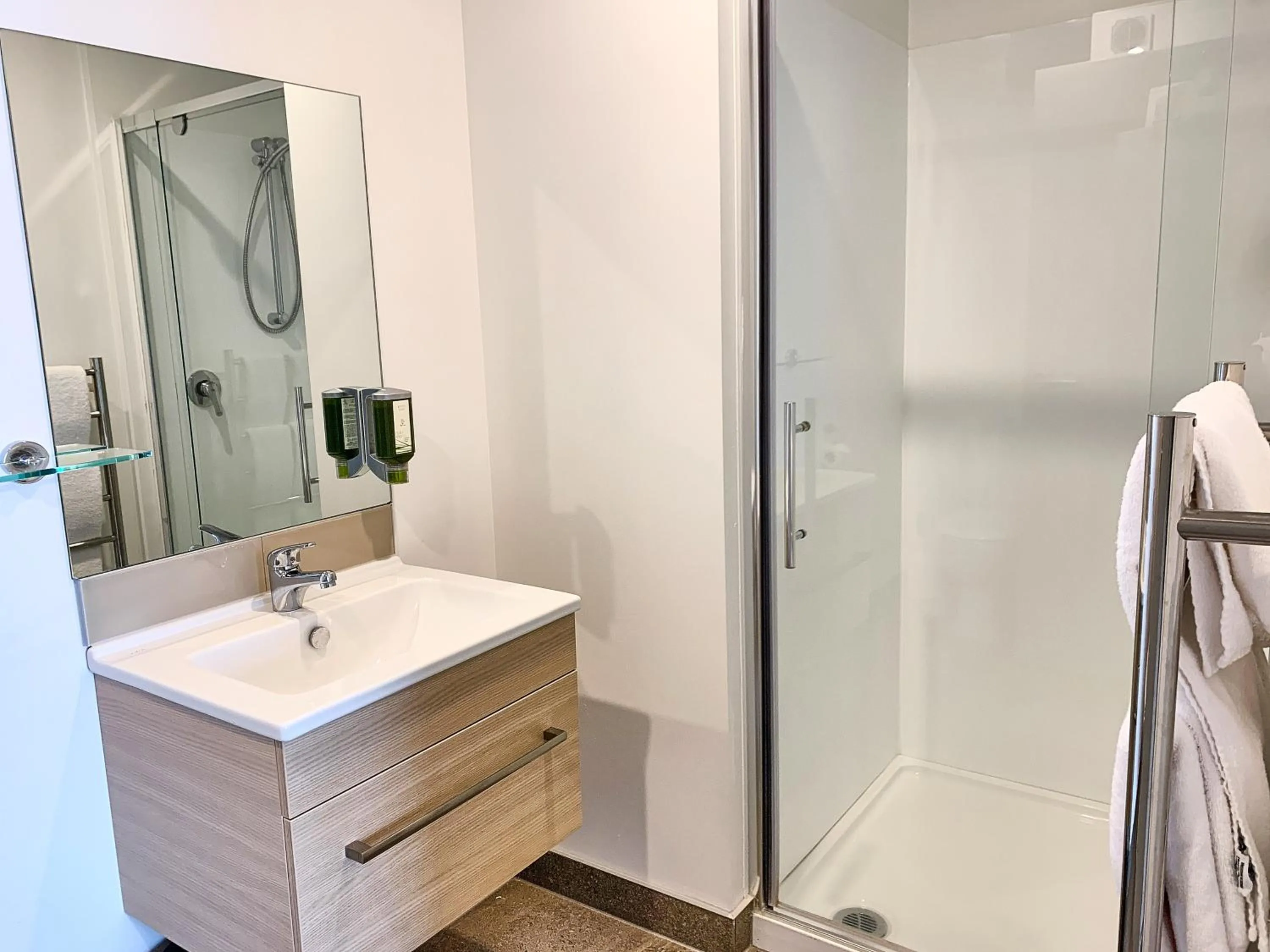 Bathroom in Ramada Suites by Wyndham Albany