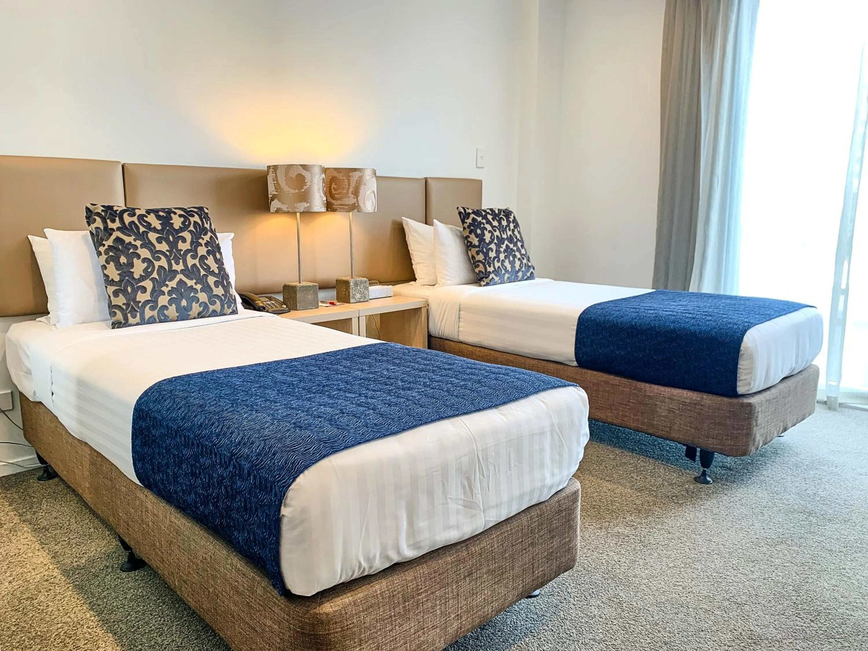 Bed in Ramada Suites by Wyndham Albany