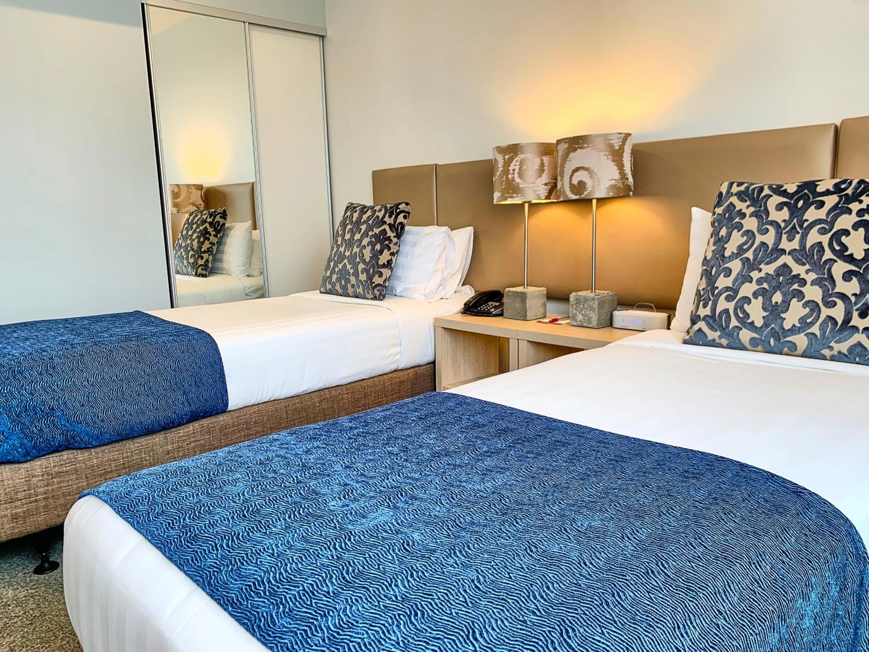 Bed in Ramada Suites by Wyndham Albany