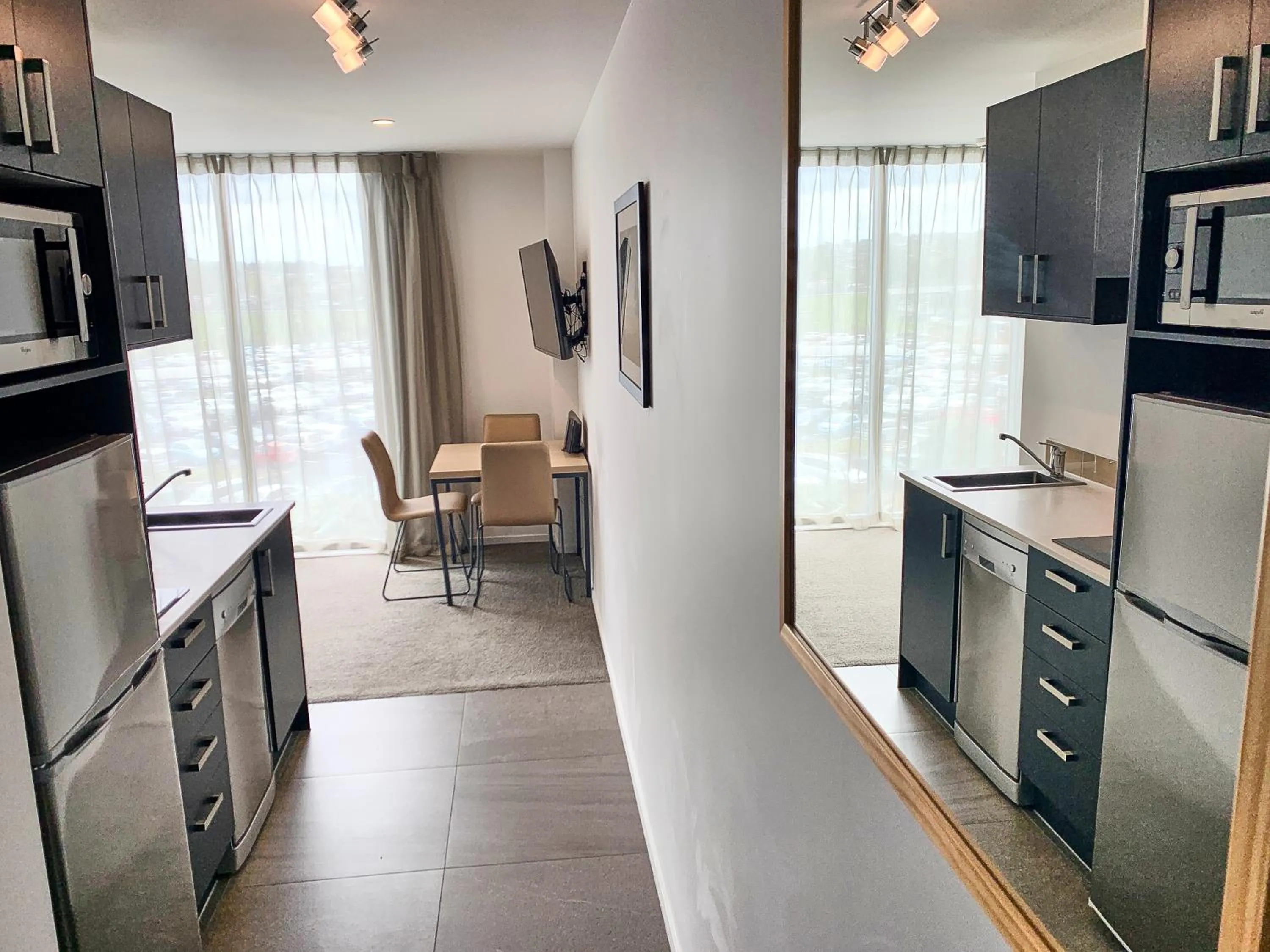 Kitchen or kitchenette in Ramada Suites by Wyndham Albany