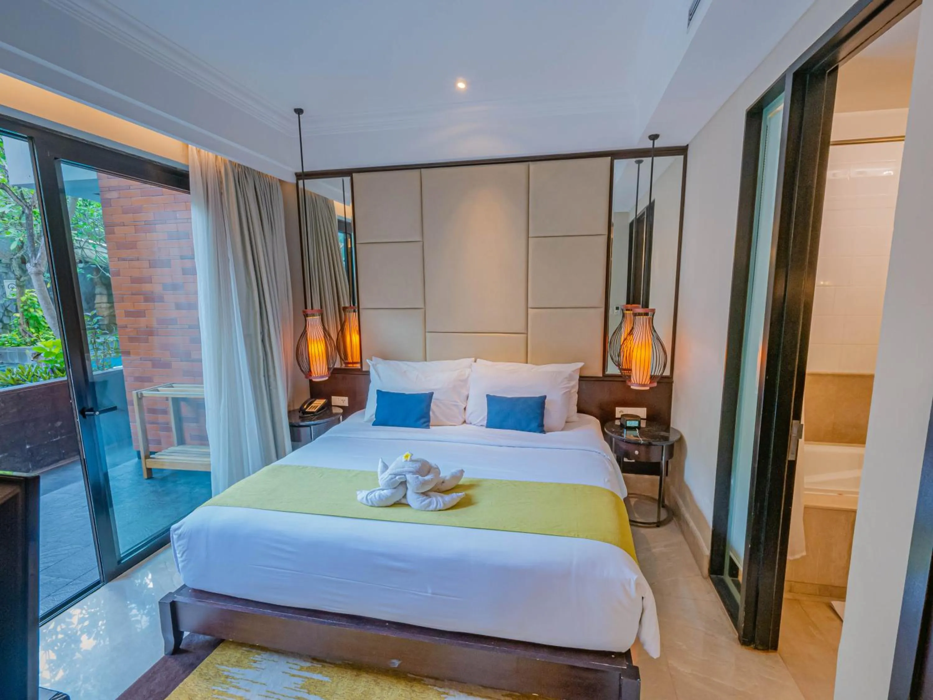 Bed in Jambuluwuk Oceano Seminyak Hotel