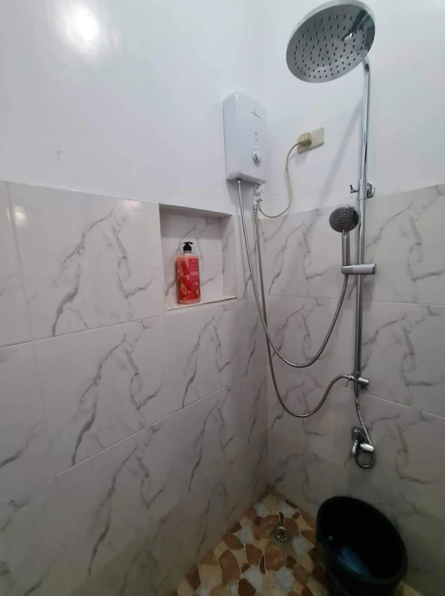 Shower in Alona's Traditional Filipino Home near 100 Islands Wharf