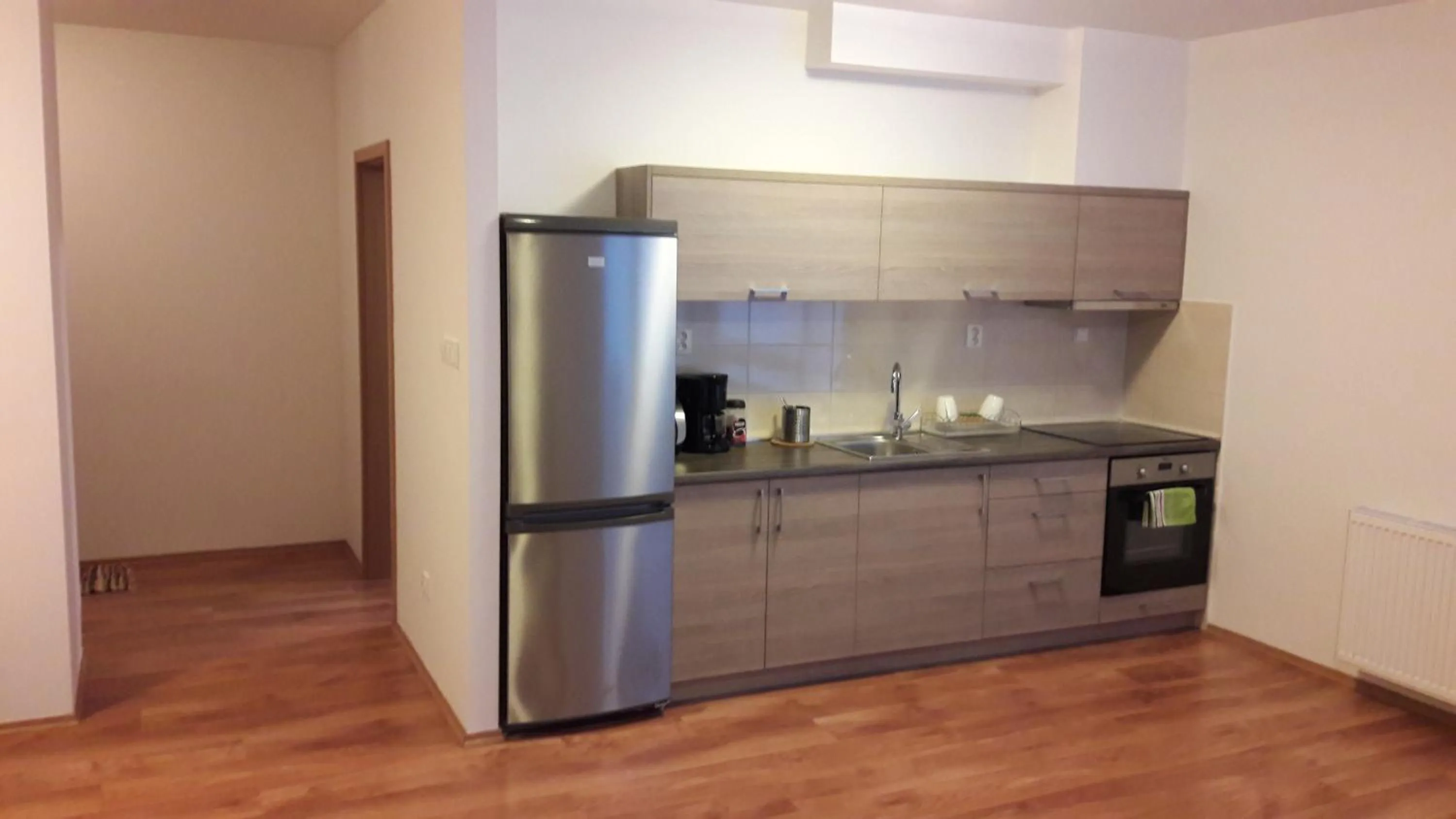 Kitchen or kitchenette in Modern city center apartment with private parking