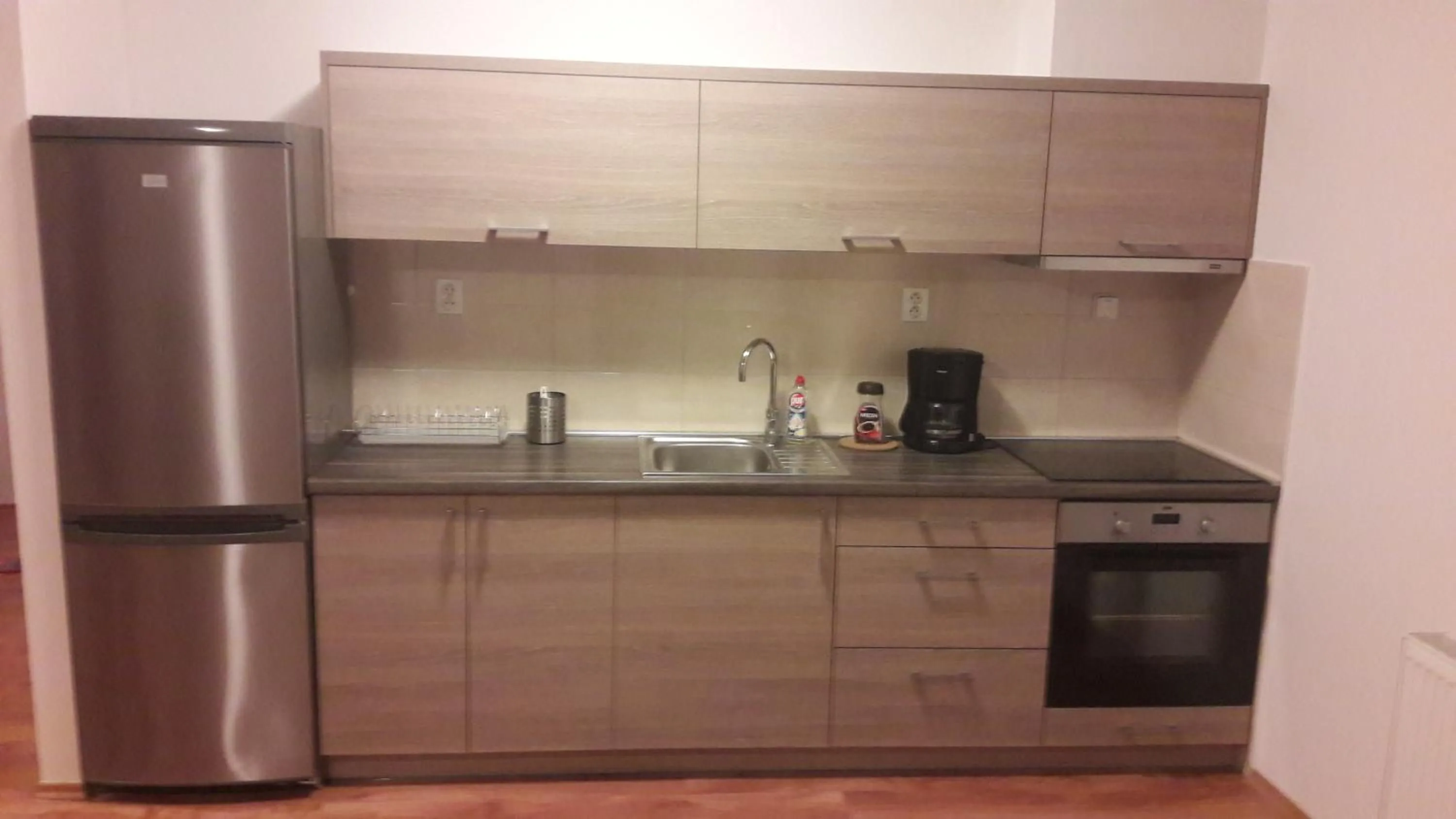Kitchen or kitchenette in Modern city center apartment with private parking