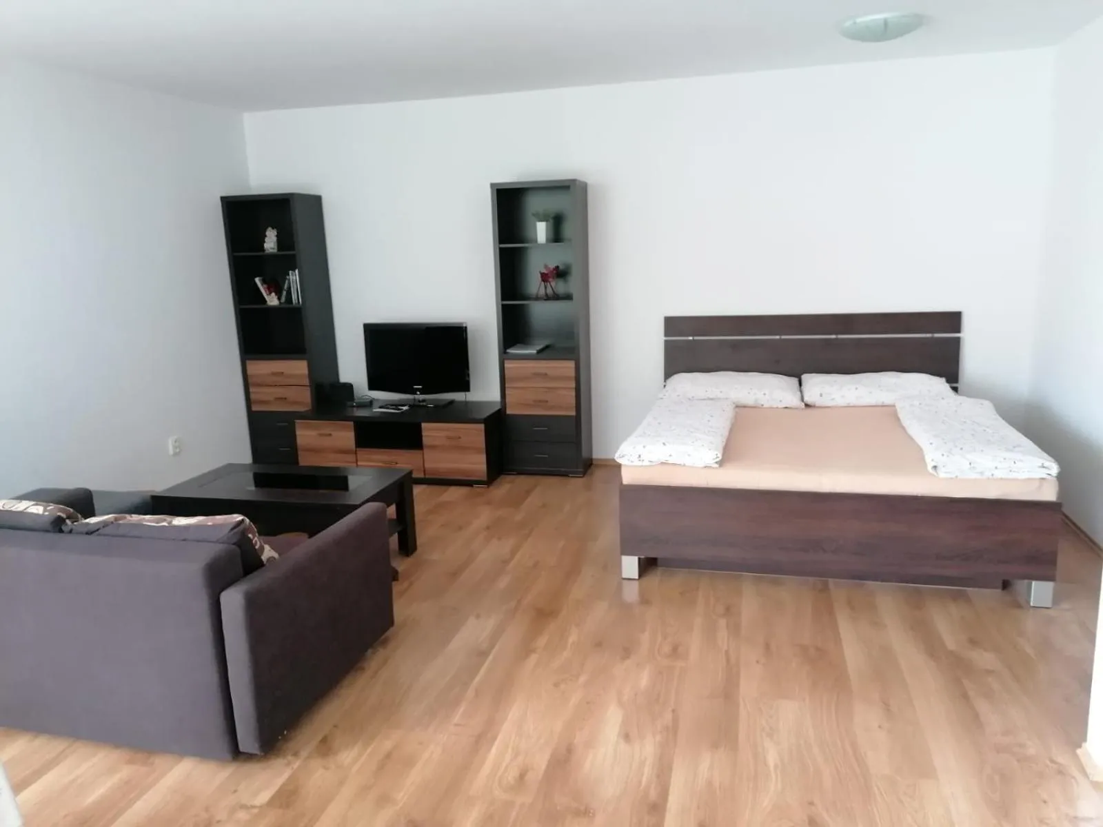 Living room, Bed in Modern city center apartment with private parking