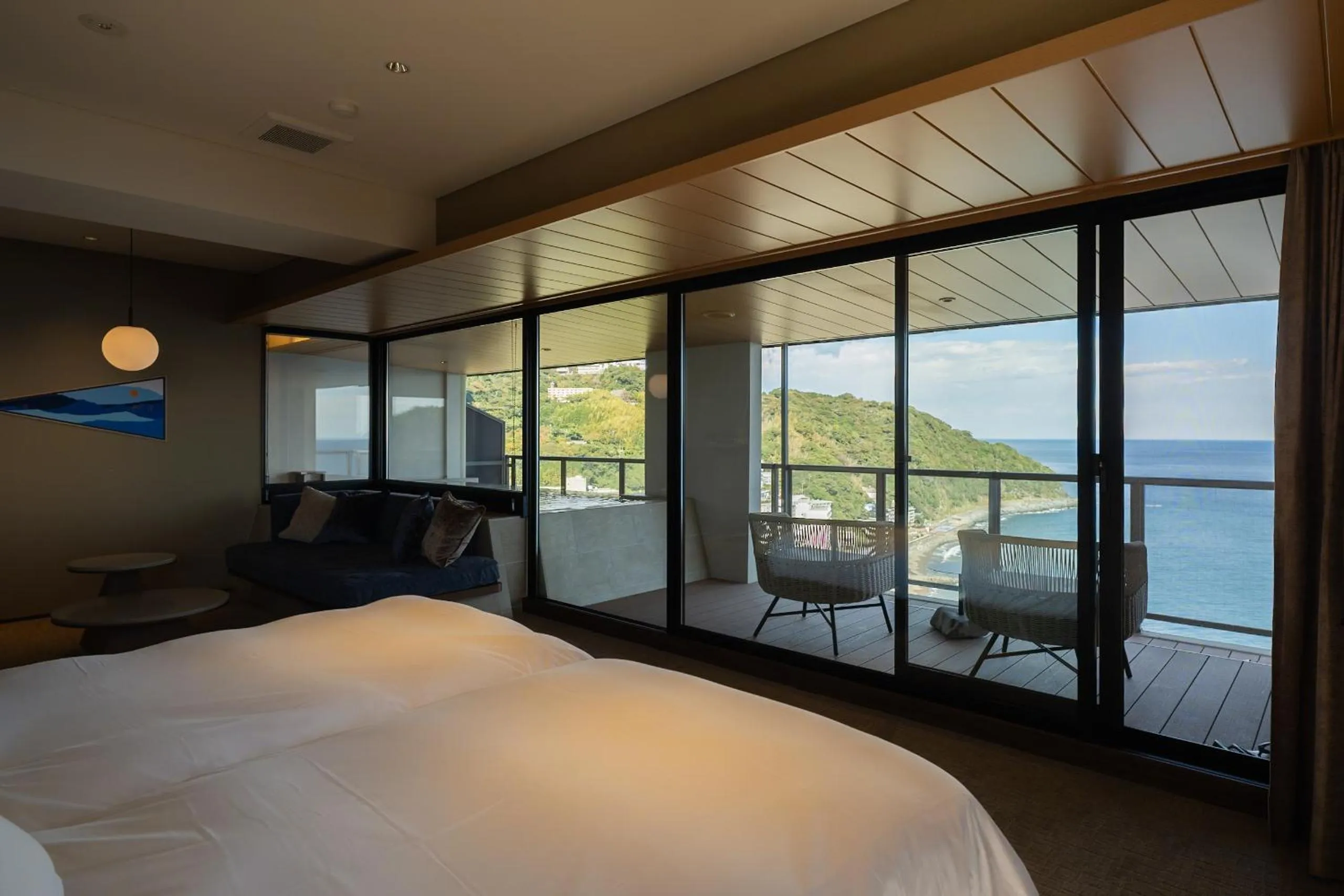 Photo of the whole room, Bed in IZU RETREAT by Onko Chishin