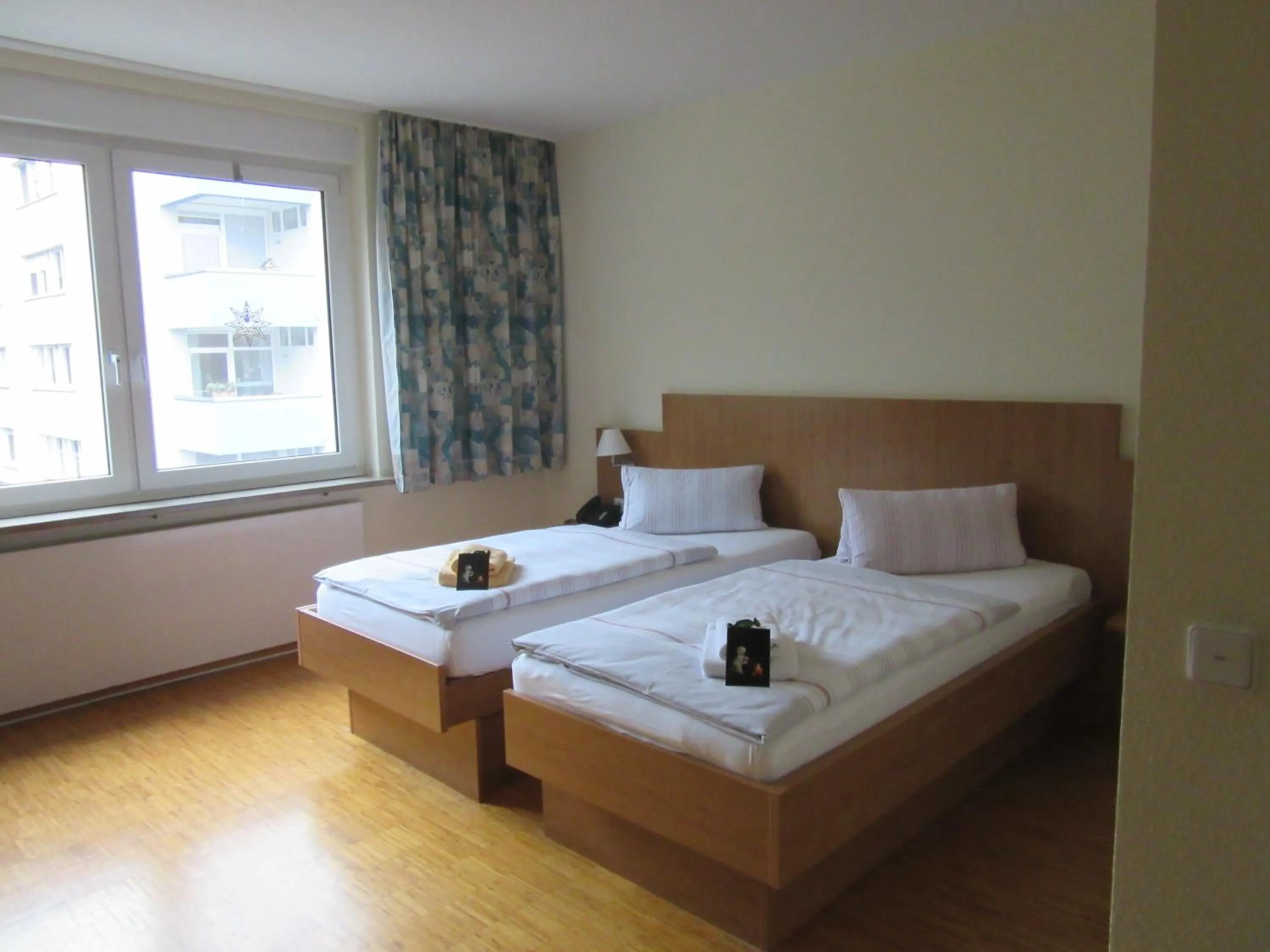 Photo of the whole room, Bed in Das Gästehaus Puschendorf