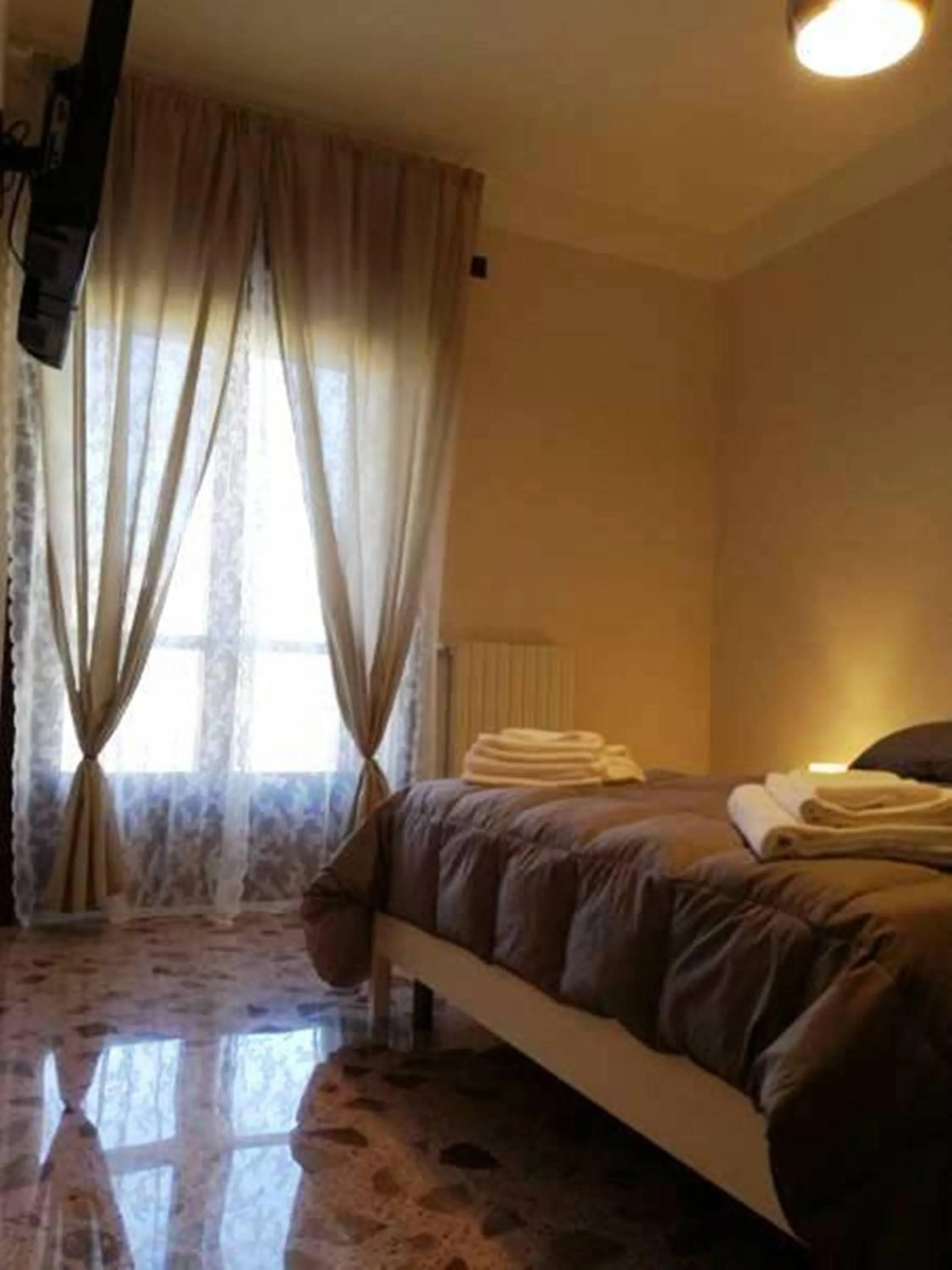 Bedroom in B&B Amina