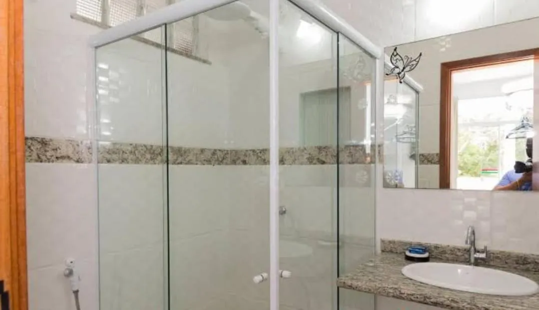 Shower in Pousada Recanto Barra da Tijuca