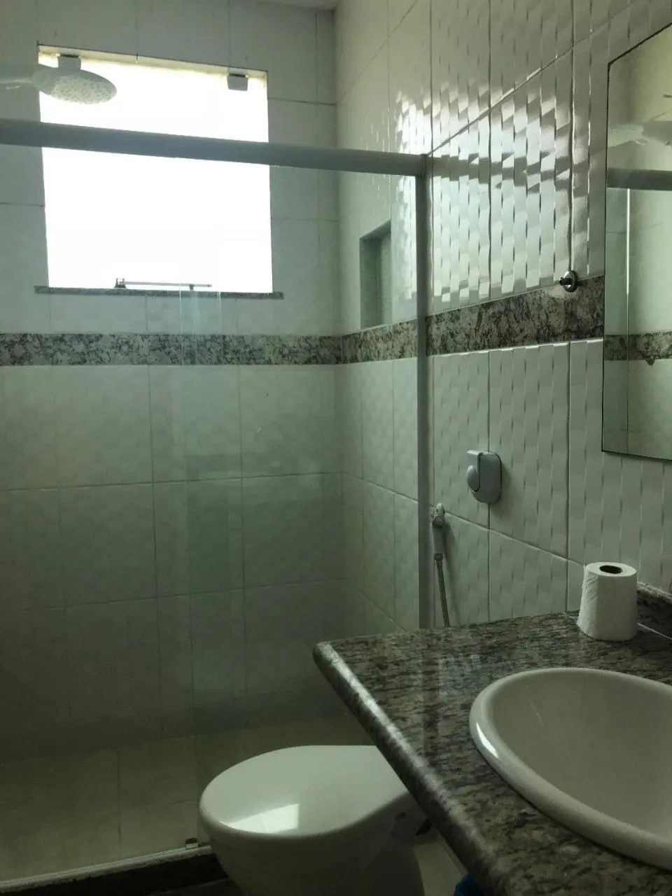 Shower in Pousada Recanto Barra da Tijuca