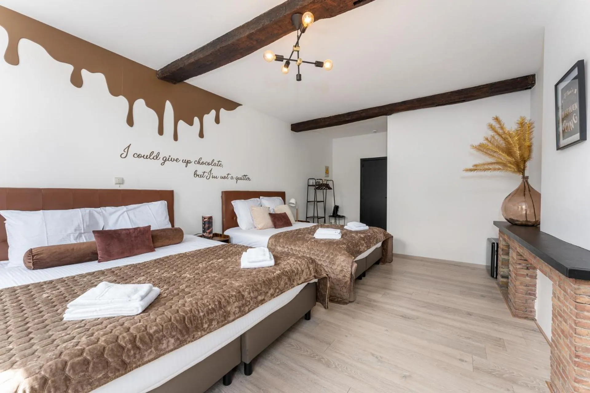 Photo of the whole room, Bed in The Chocolate Suites