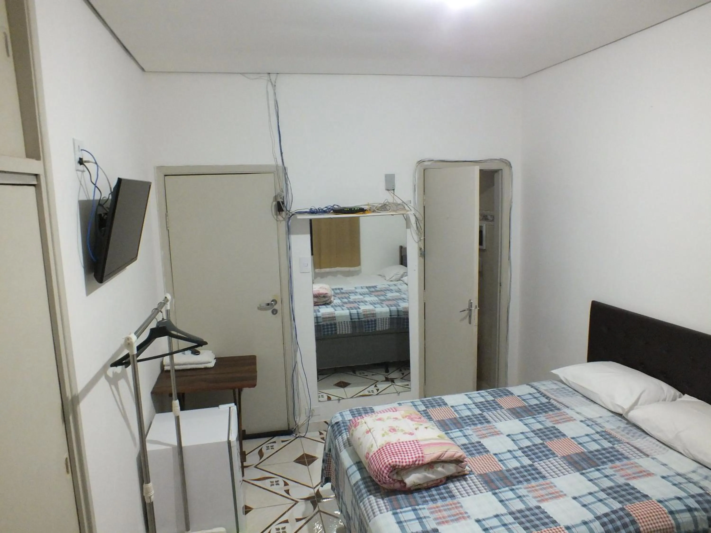Quadruple Room with Private Bathroom - single occupancy in Hospedagem Henri Dunant