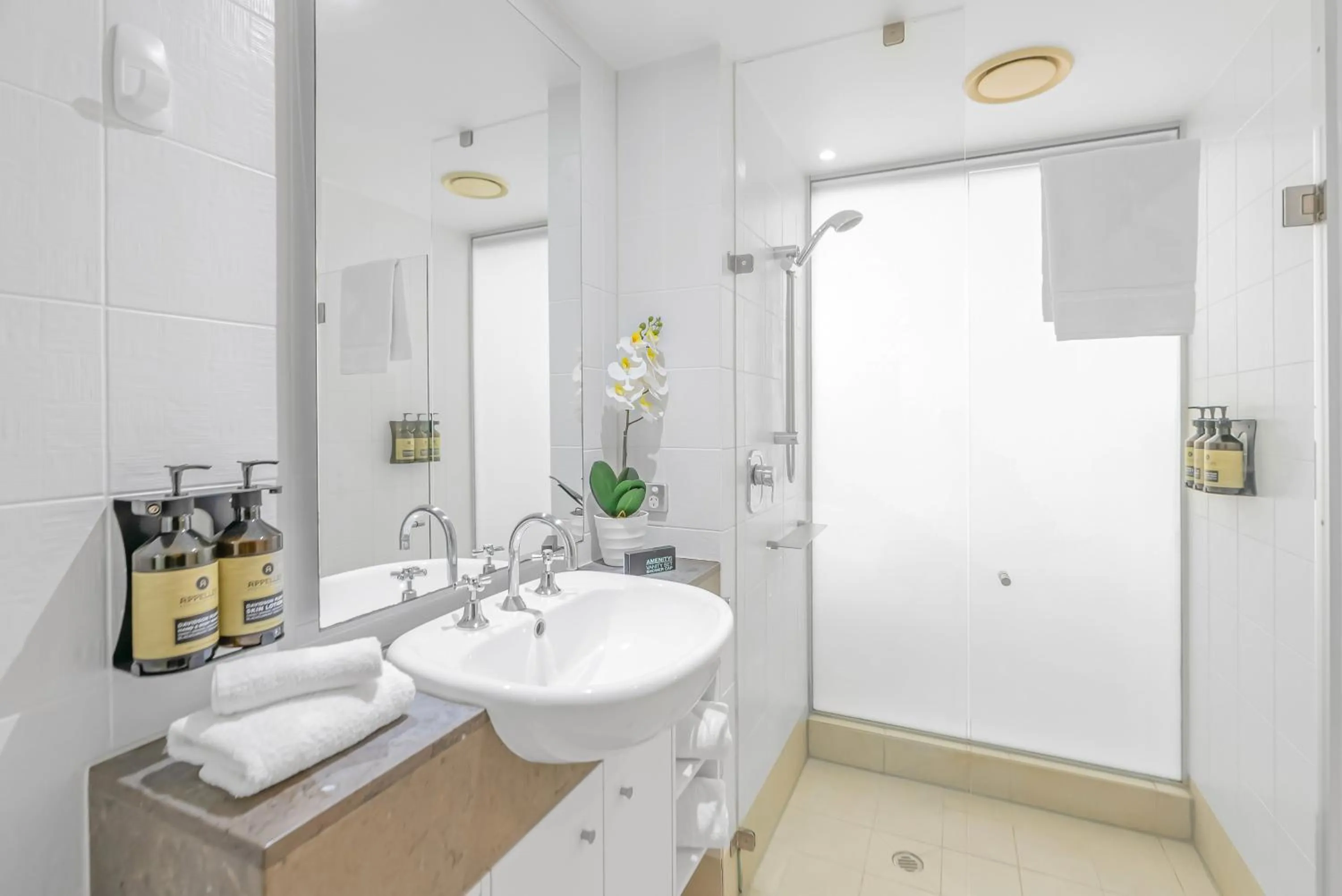 Shower in Elysium Private Apartments at Beach Club & Spa