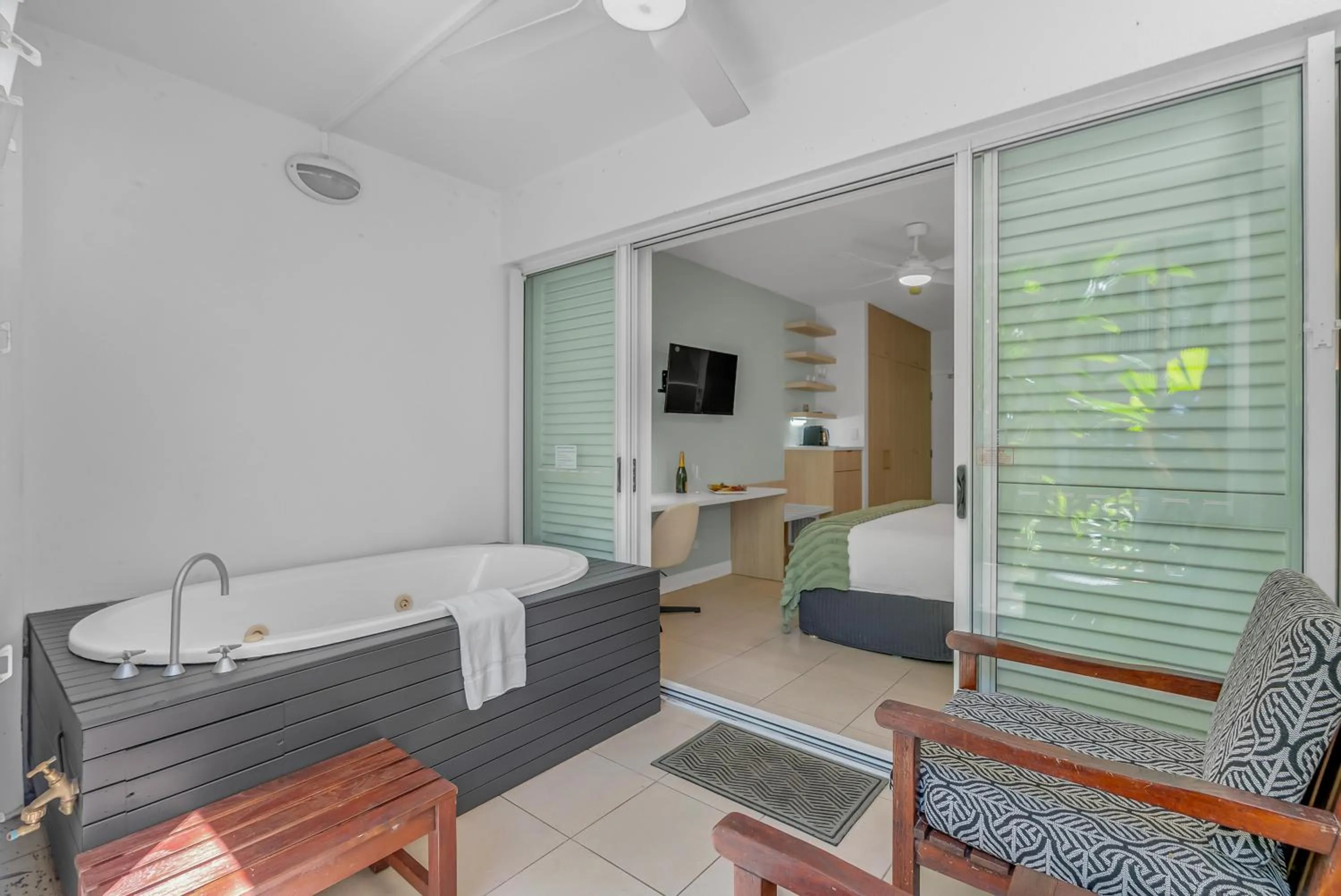 Patio, Bed in Elysium Private Apartments at Beach Club & Spa