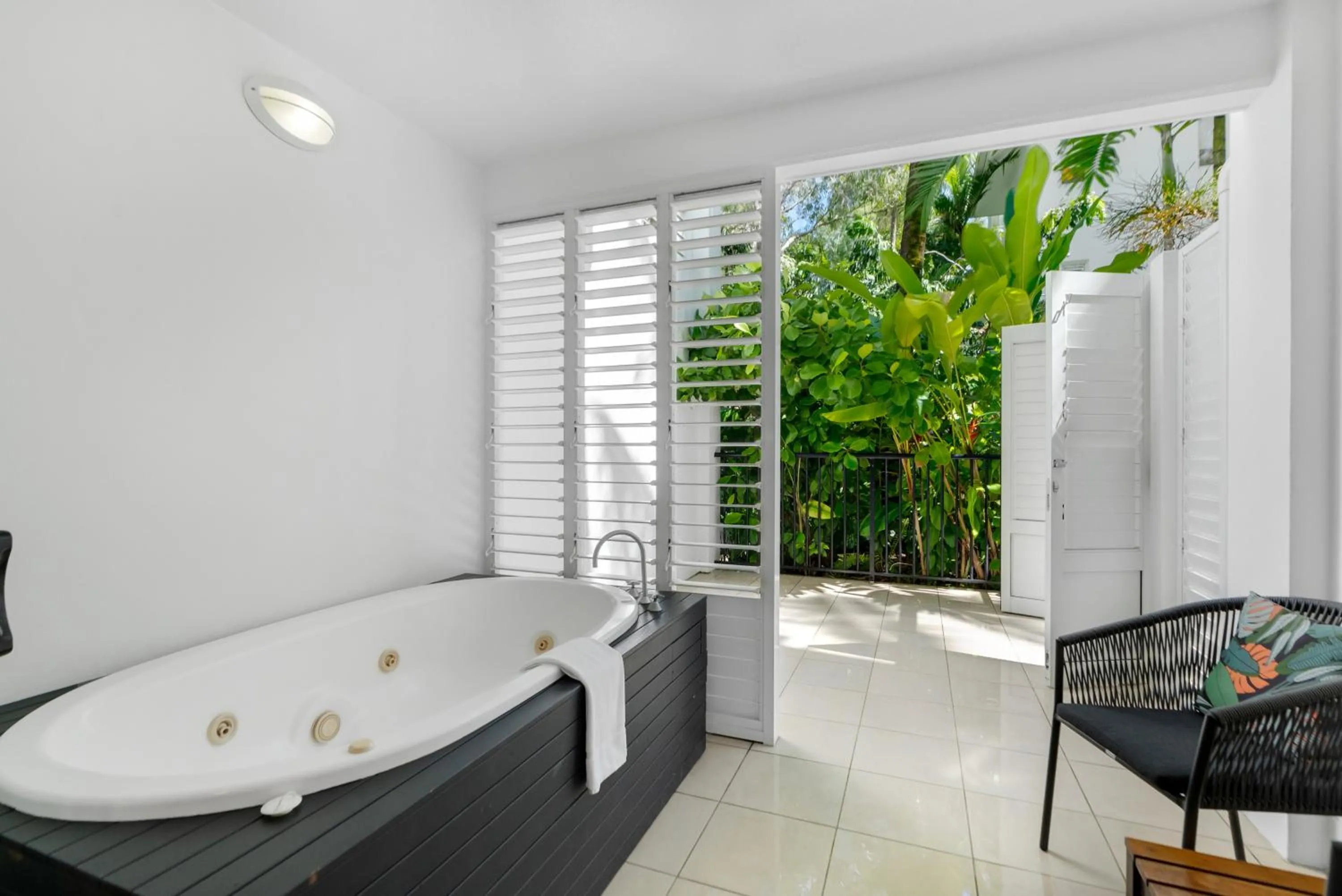 Patio, Bed in Elysium Private Apartments at Beach Club & Spa