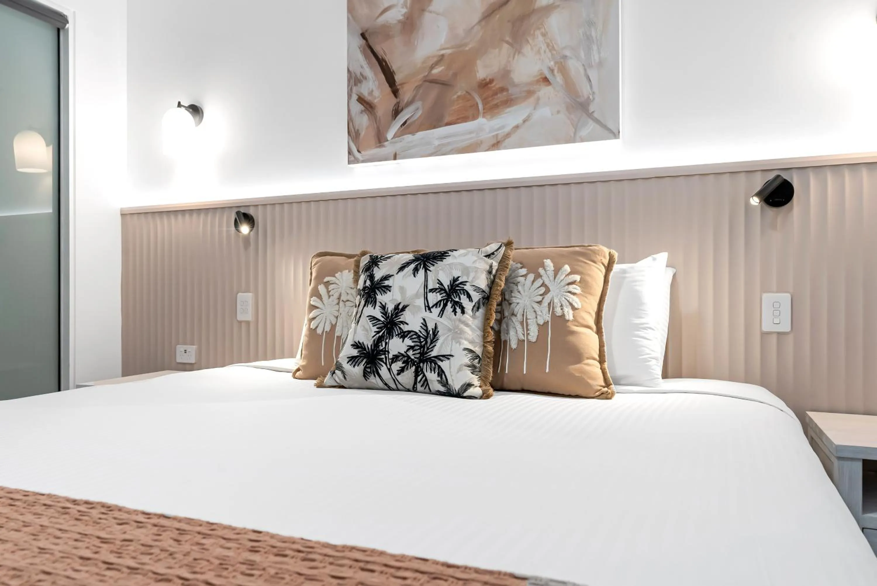 Bed in Elysium Private Apartments at Beach Club & Spa