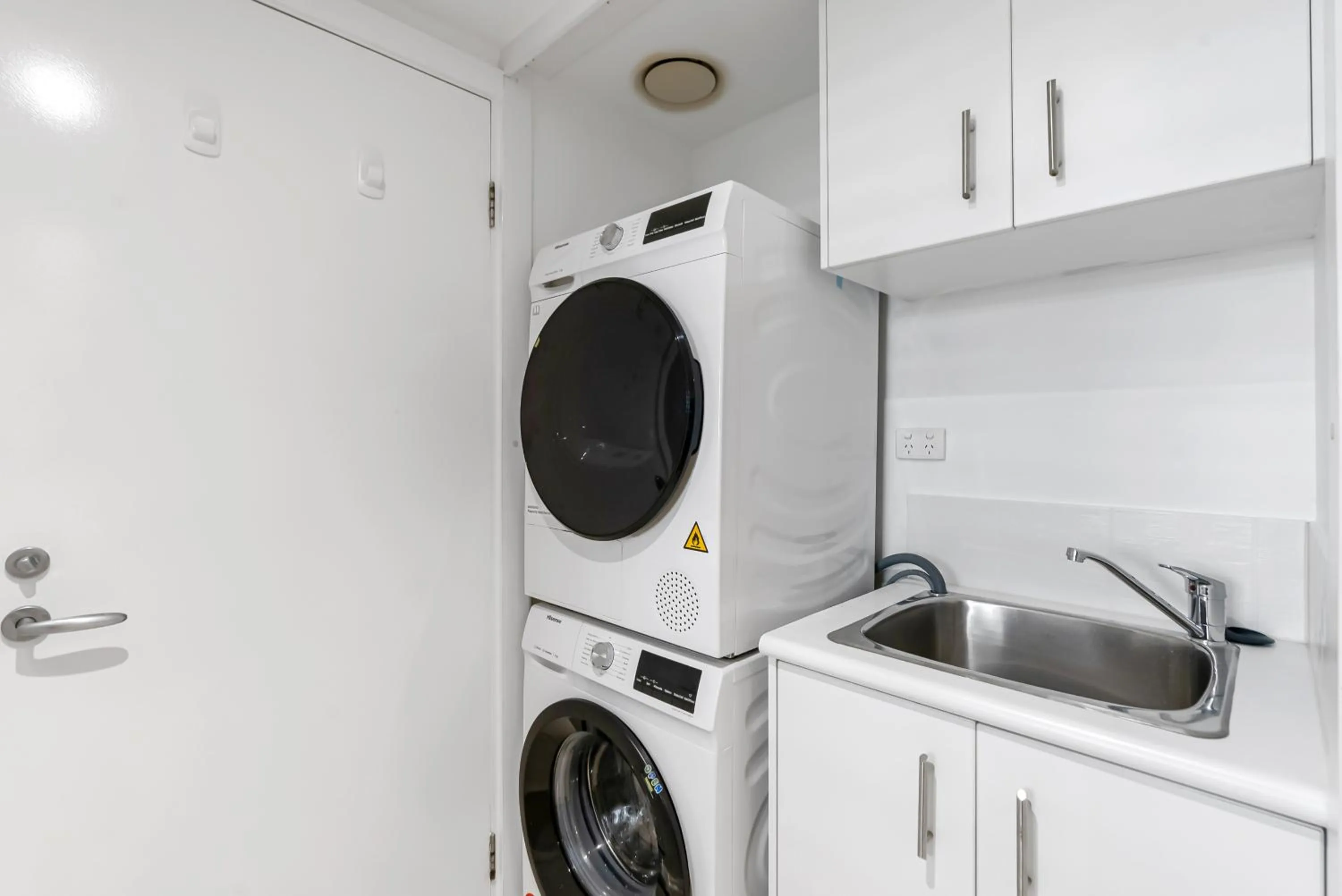 laundry in Elysium Private Apartments at Beach Club & Spa