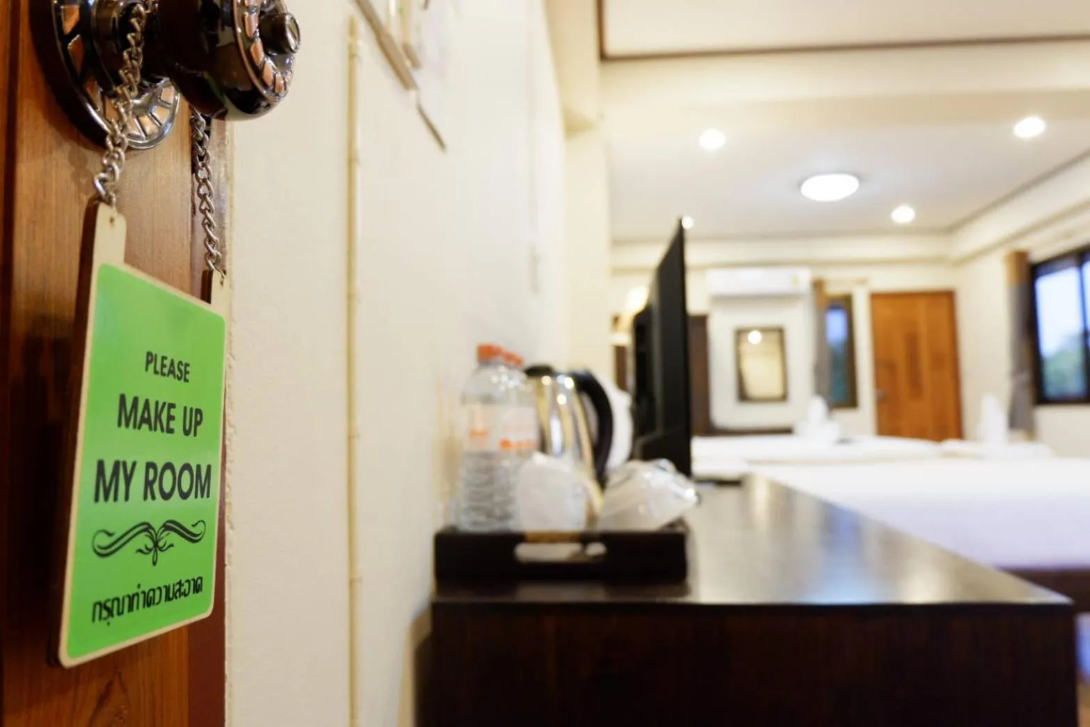 Bed in NanBaanKhun Hotel