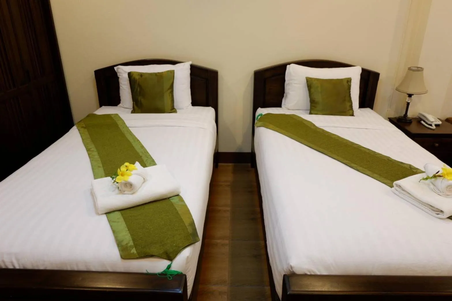 Bed in NanBaanKhun Hotel