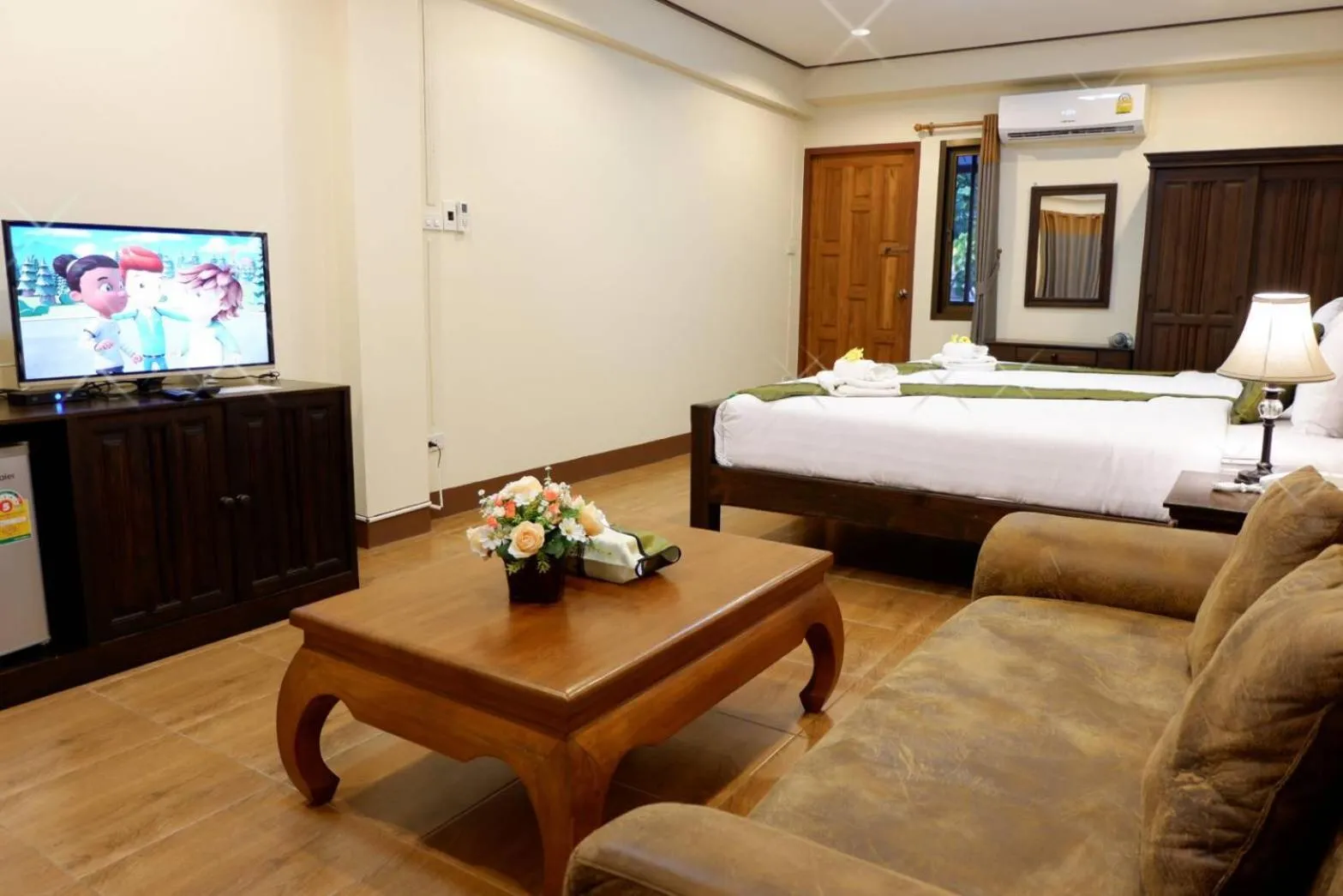 Bed in NanBaanKhun Hotel